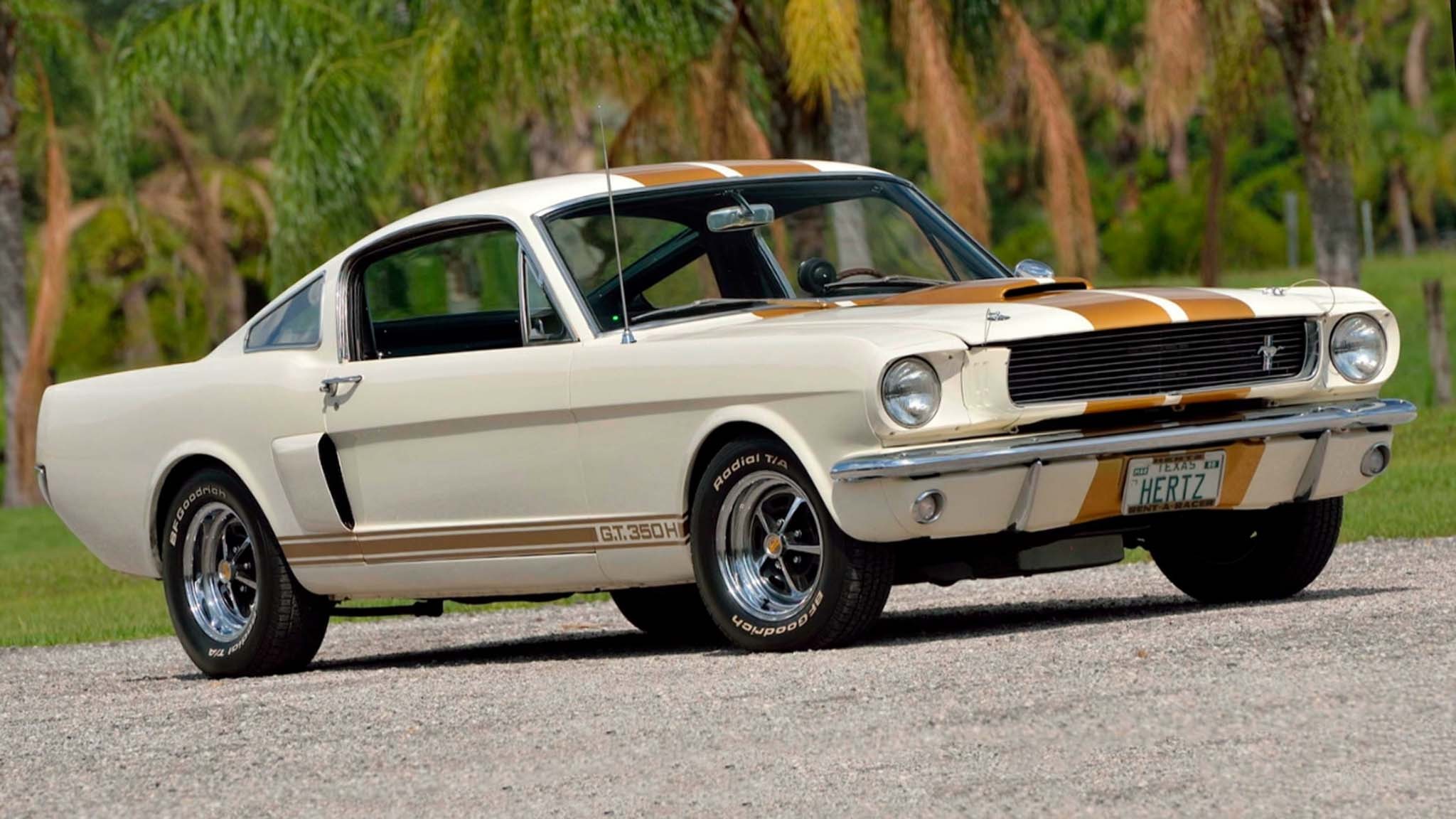 002 1966 Ford Mustang Shelby GT350H Hertz Fastback Mecum Orlando Wimbeldon white gold