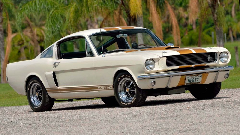 002 1966 Ford Mustang Shelby GT350H Hertz Fastback Mecum Orlando Wimbeldon white gold