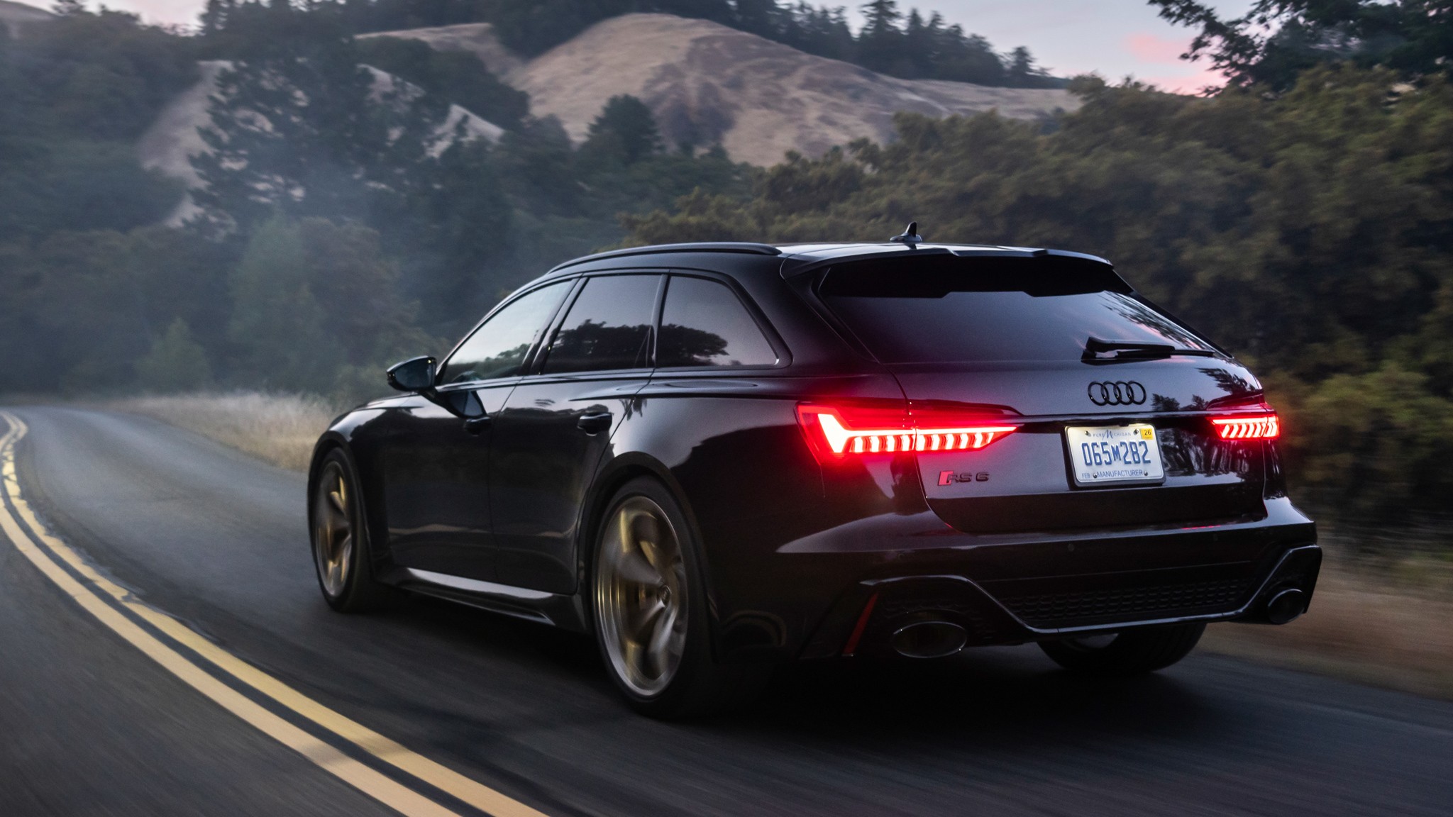 023 2024 Audi RS6 Avant performance rear three quarters in action