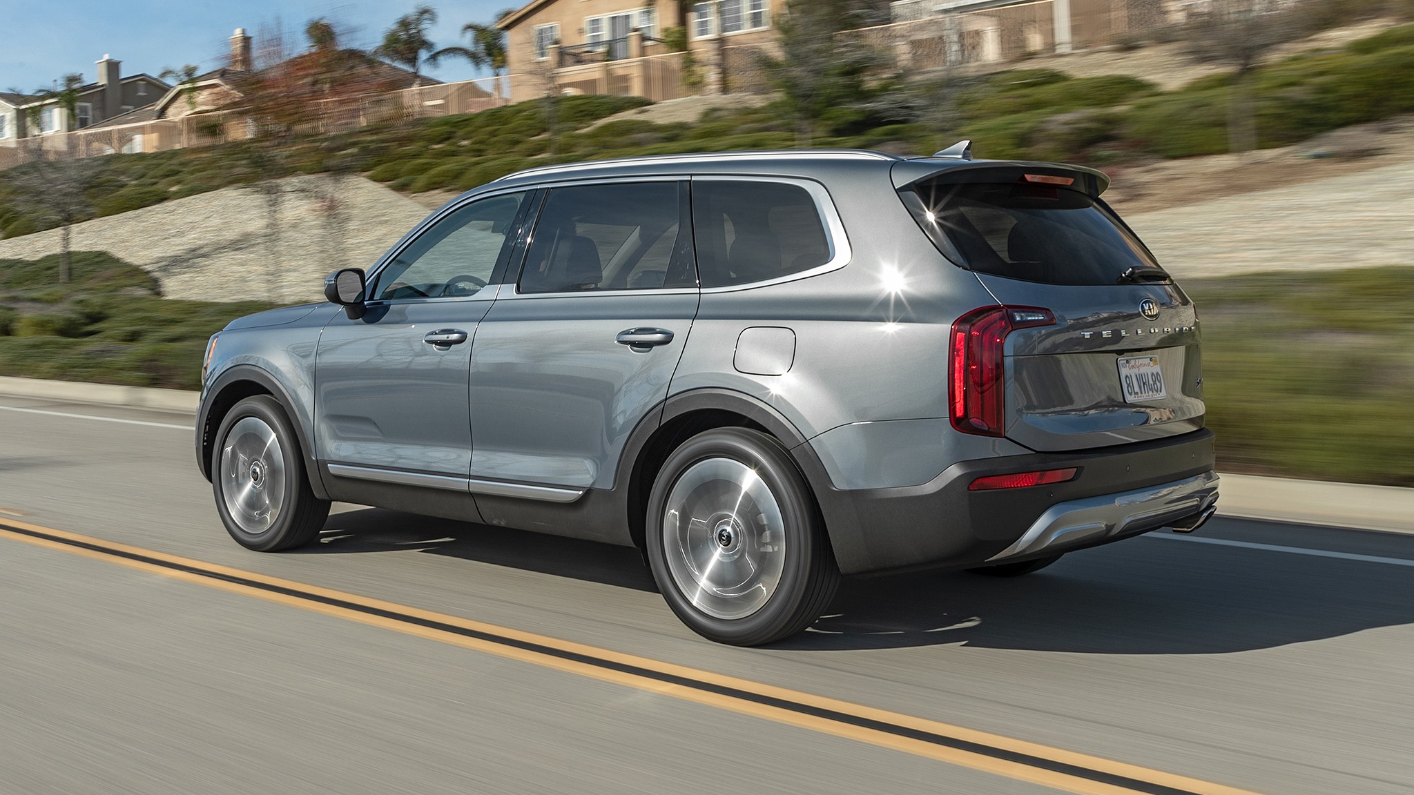 2020 Kia Telluride S V6 rear three quarter in motion 2