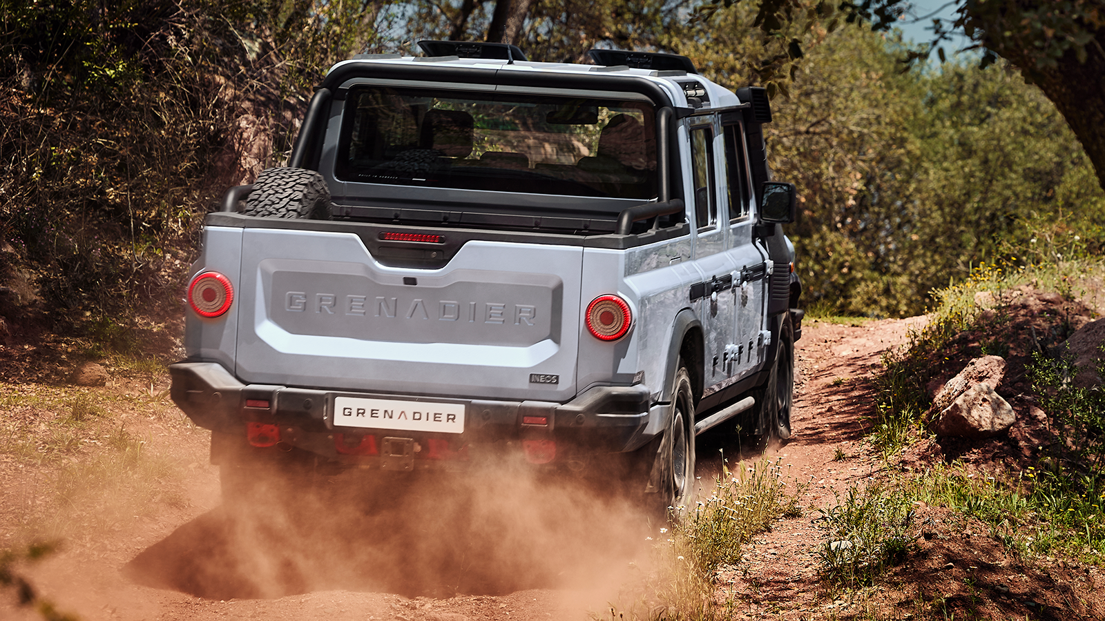 Ineos Grenadier Quartermaster off road pickup truck rear dirty