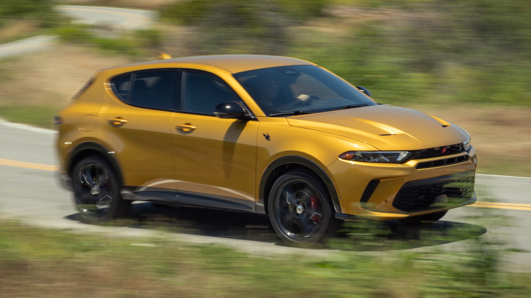 002 2024 Dodge Hornet R T front three quarters in action