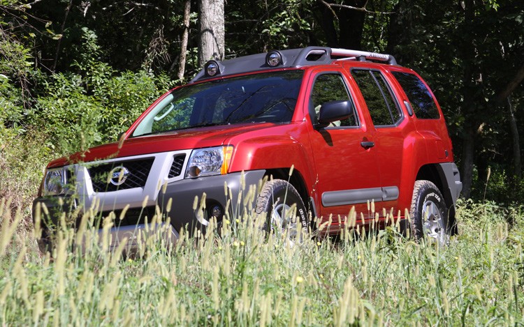 2011 nissan xterra pro 4x front three quarters driver1