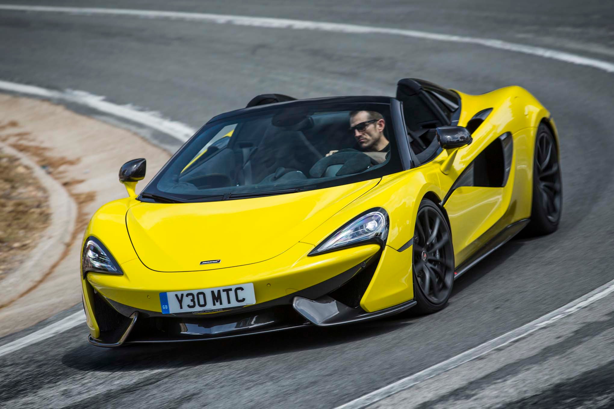 2017 Mclaren 570S Spider front three quarter in motion