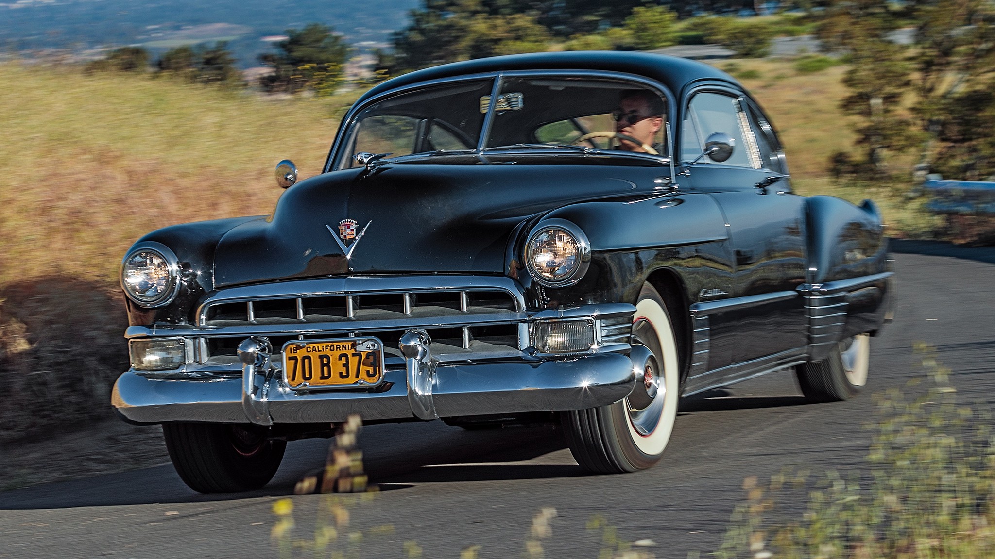 1949 Cadillac Series 62 Sedanette front three quarter in motion 1