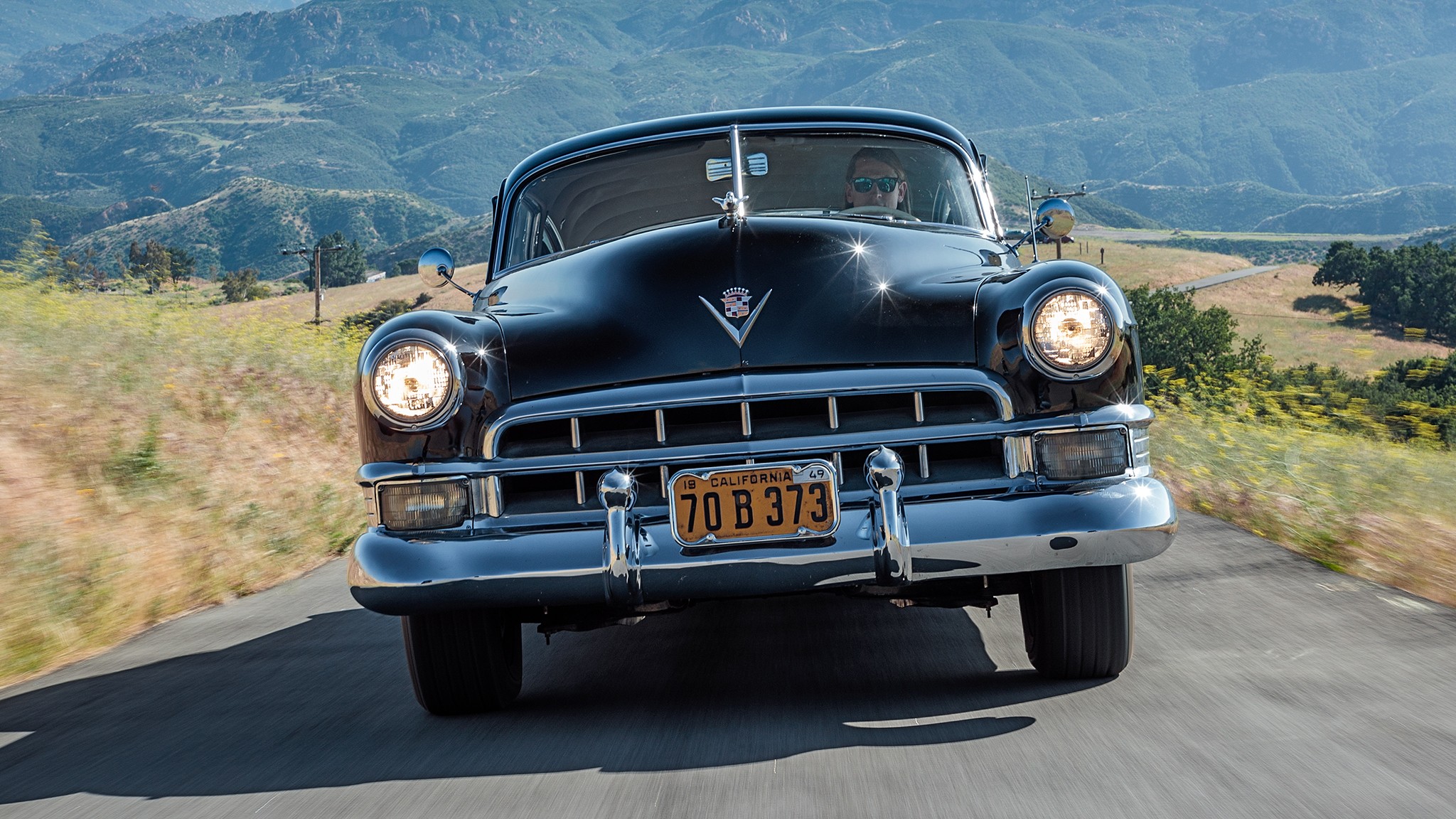 1949 Cadillac Series 62 Sedanette front in motion