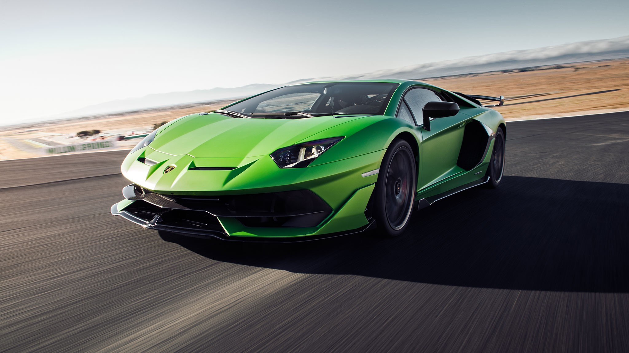 2019 Lamborghini Aventador SVJ front three quarter in motion 3