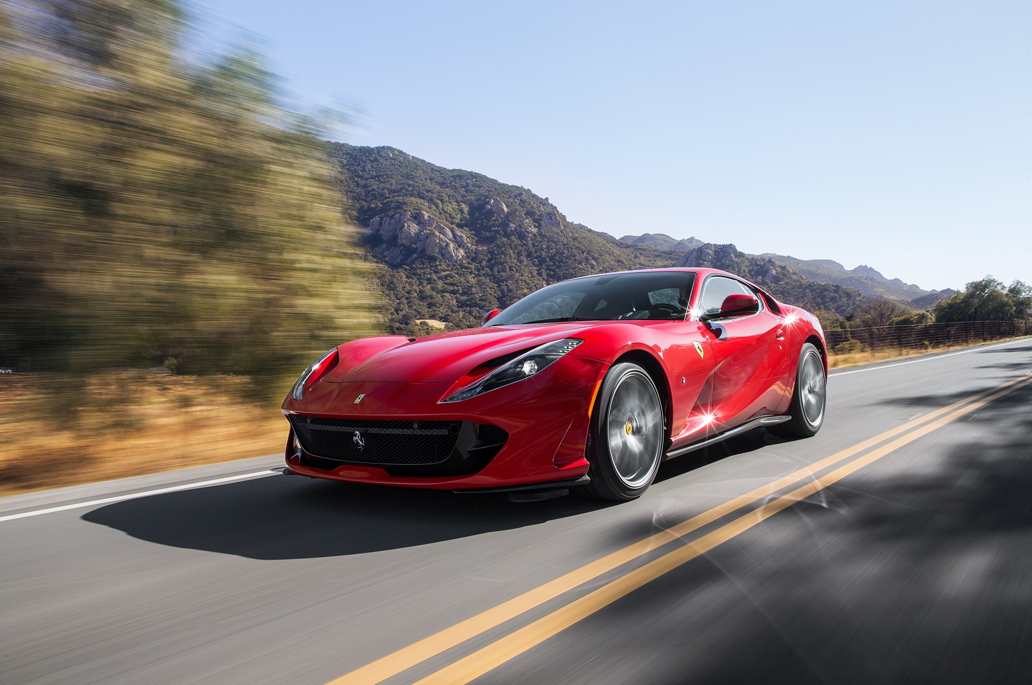 2018 Ferrari 812 Superfast front three quarter in motion 03