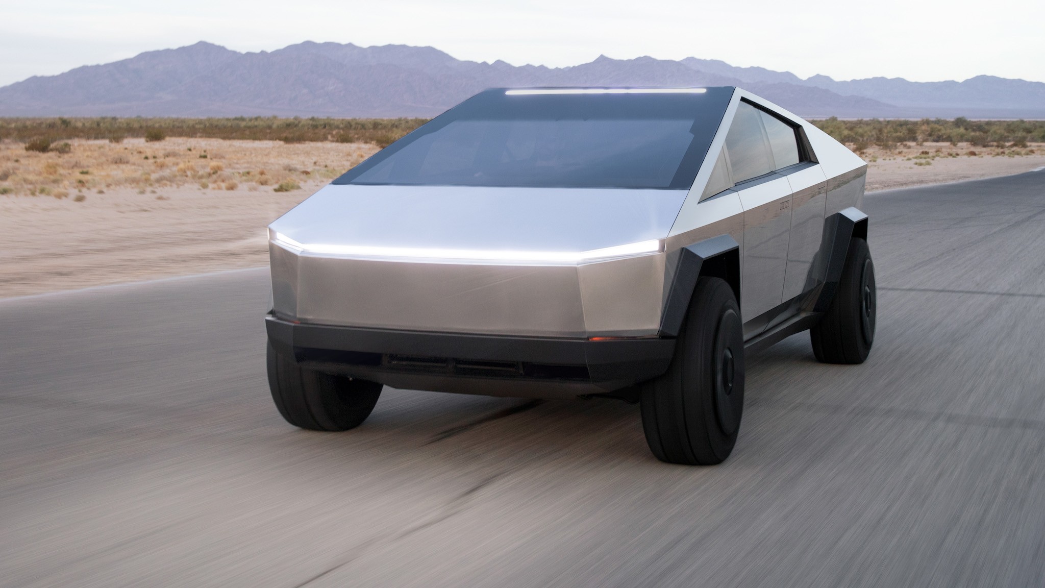 Tesla Cybertruck Electric Pickup Truck Front 3 4 in Motion 2