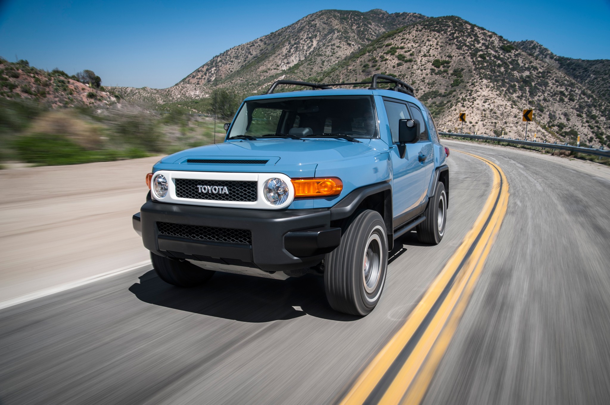 2014 Toyota FJ Cruiser Trail Teams Ultimate Edition front three quarters in motion