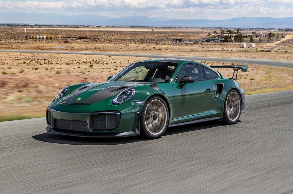 2018 Porsche GT2 RS Weissach Edition front three quarter in motion 02