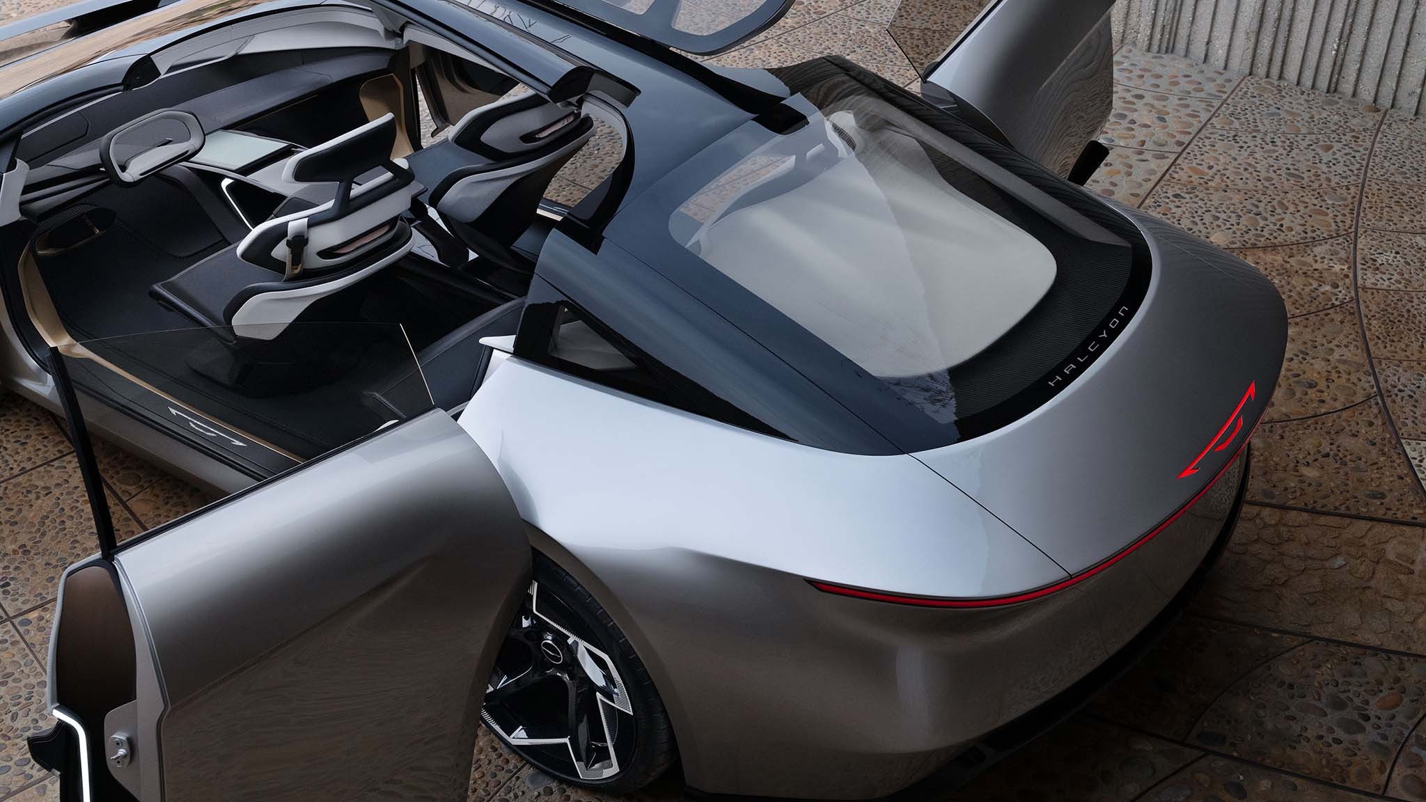 A warm Acrylic tinted butterfly hinged canopy serves as a third