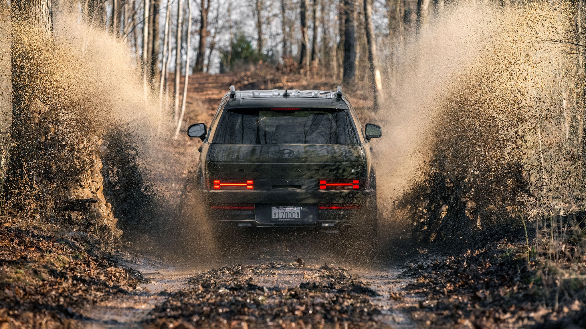 32 2024 Hyundai Santa Fe XRT rear view motion