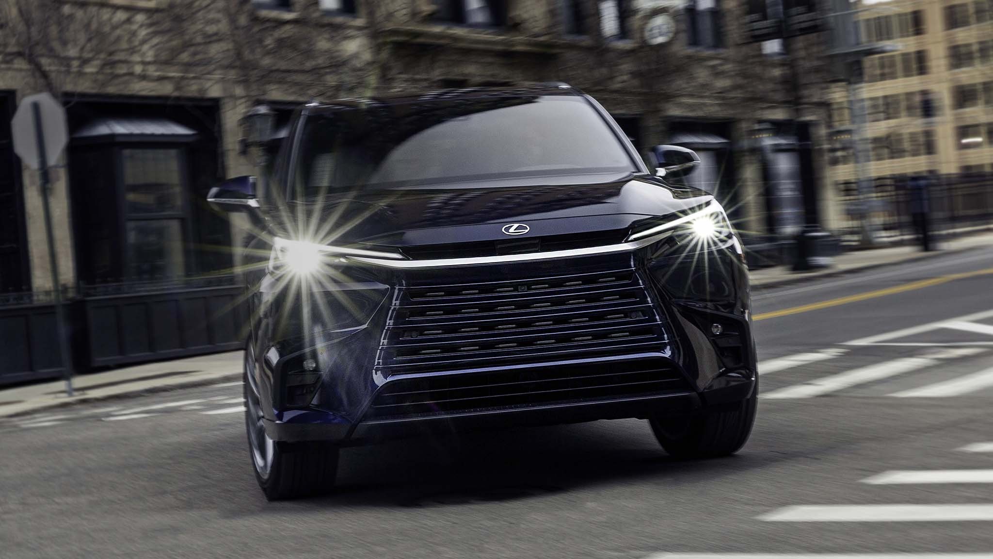 002 2024 lexus tx550h plug in hybrid front in motion view