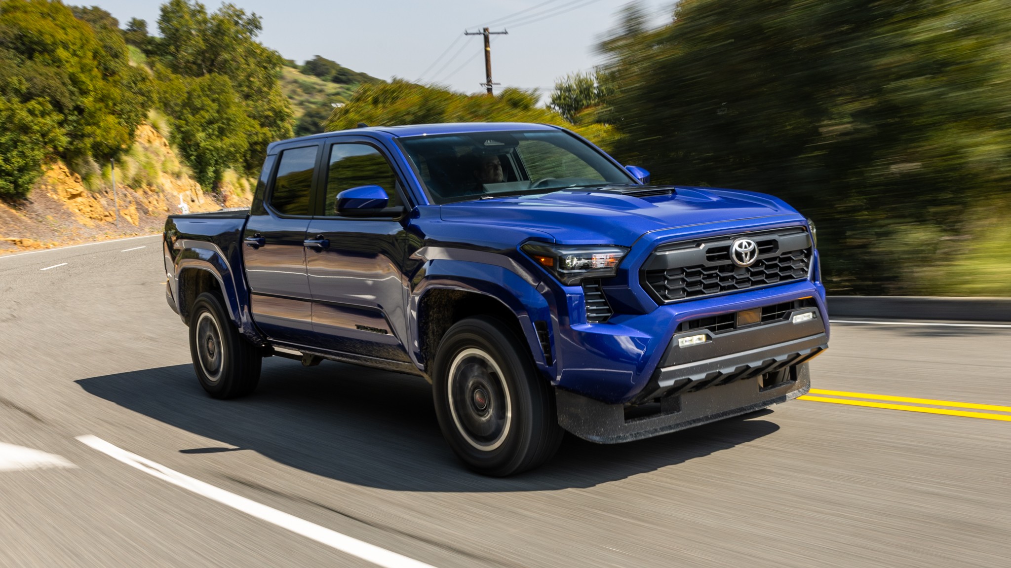 002 2024 Toyota Tacoma TRD Sport Front Quarter Motion