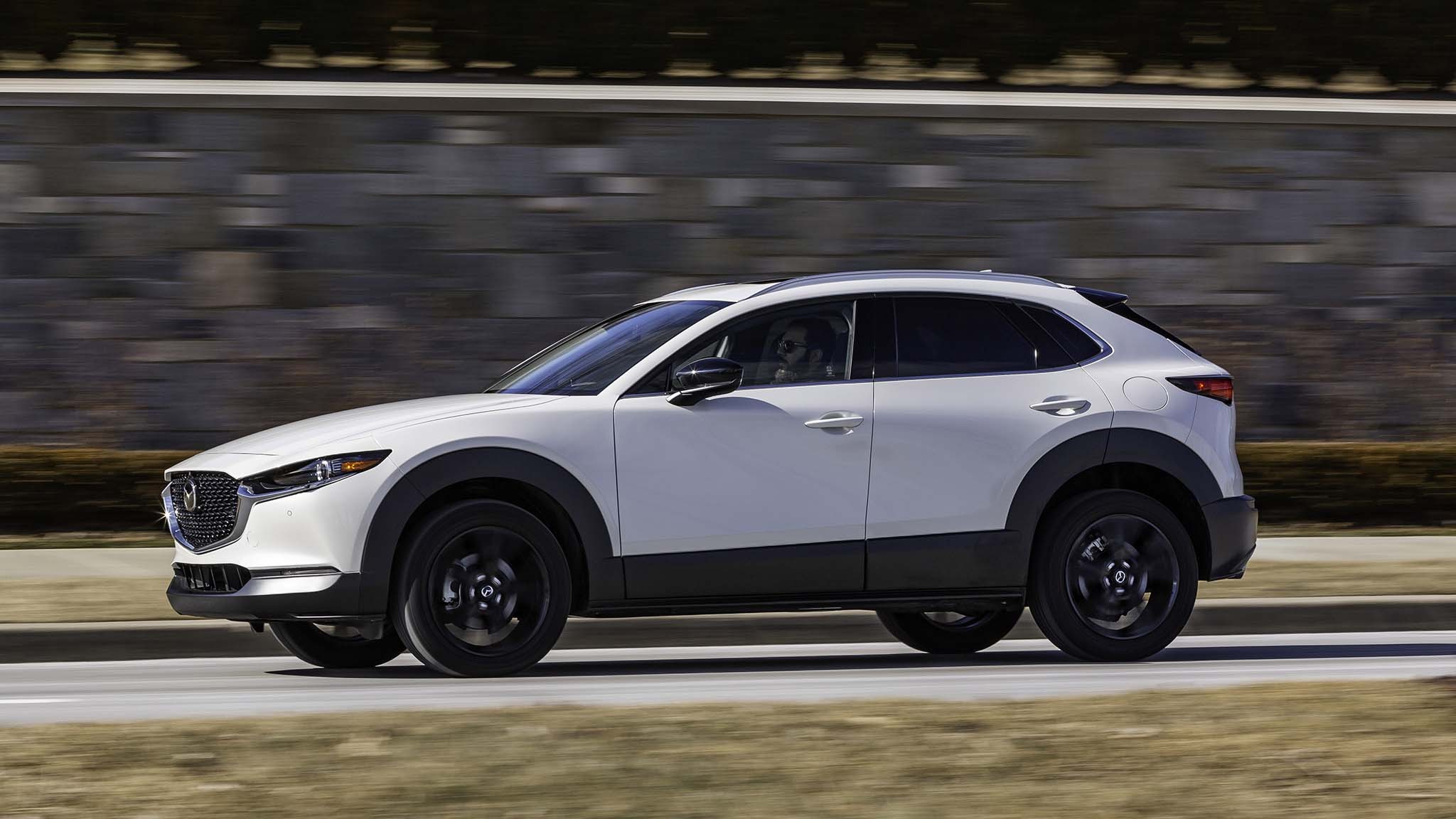 005 2024 Mazda CX 30 Turbo Premium Plus AWD side in motion view