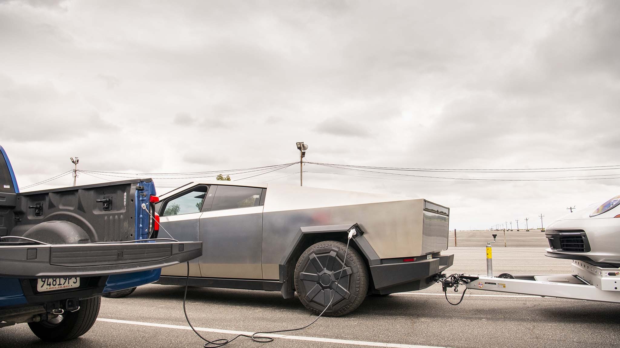 002 tesla cybertruck beast vs porsche 911 carrera t drag race towing rematch