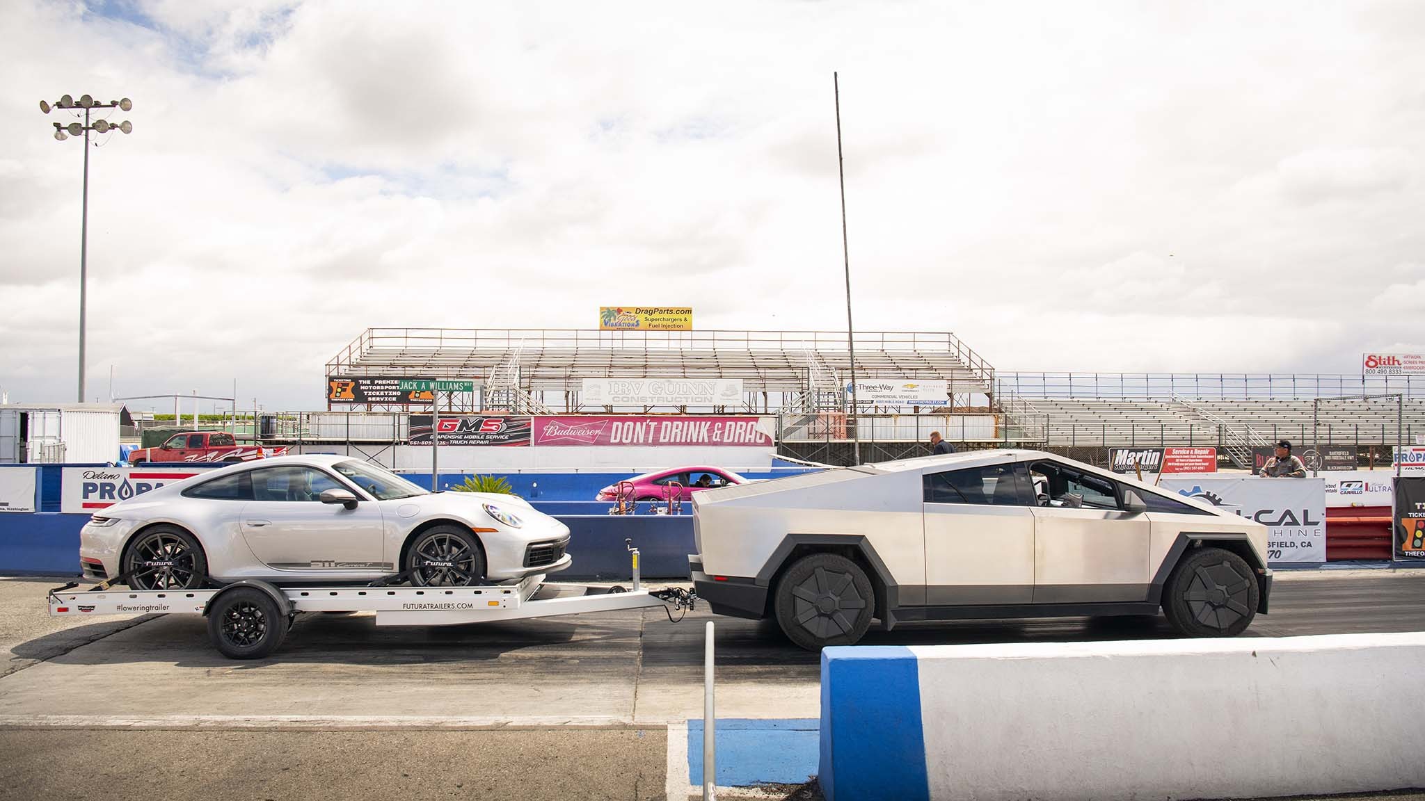 006 tesla cybertruck beast vs porsche 911 carrera t drag race towing rematch