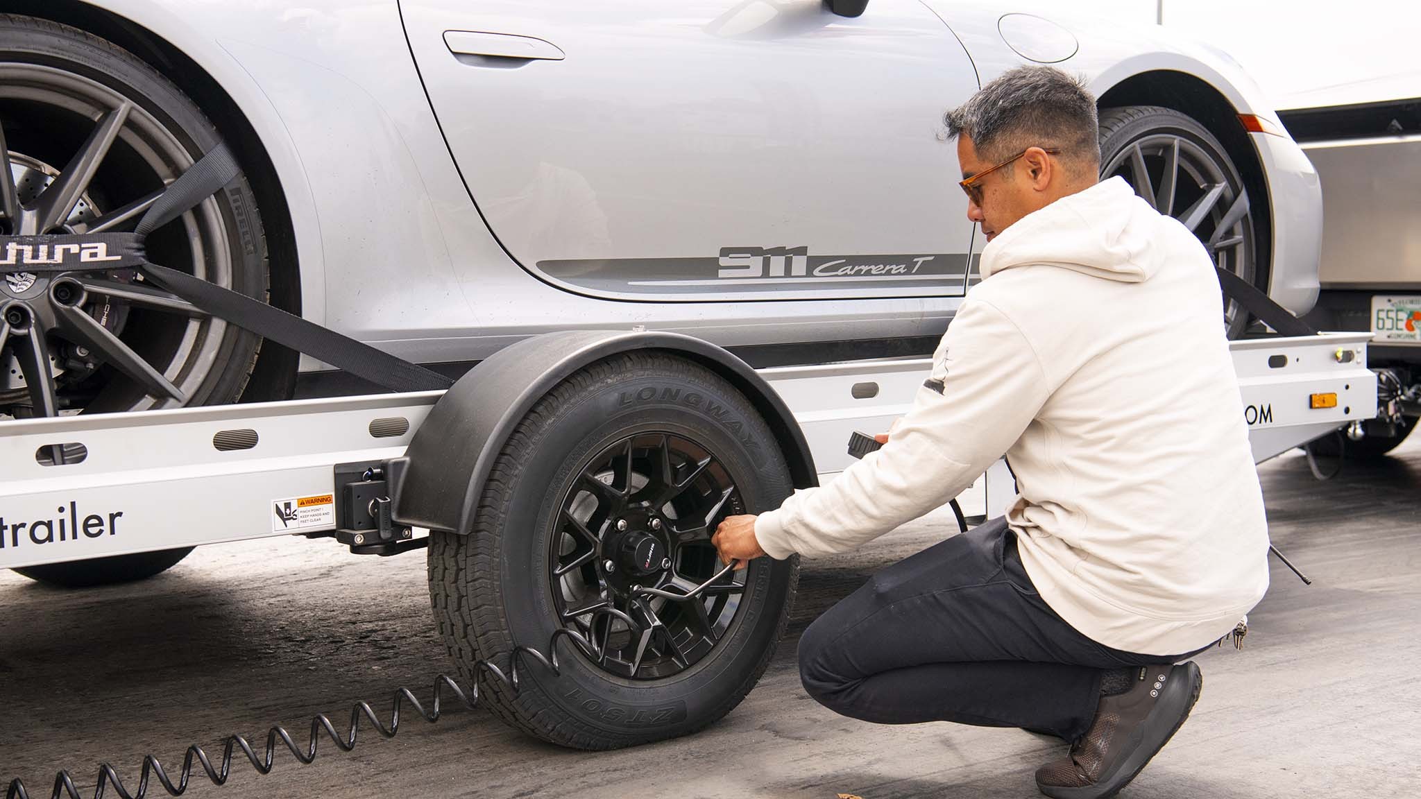 008 tesla cybertruck beast vs porsche 911 carrera t drag race towing rematch