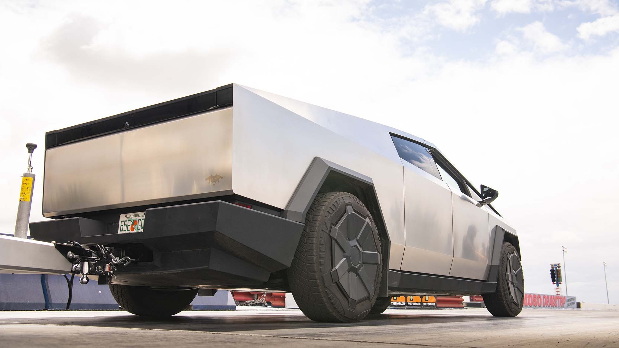 009 tesla cybertruck beast vs porsche 911 carrera t drag race towing rematch