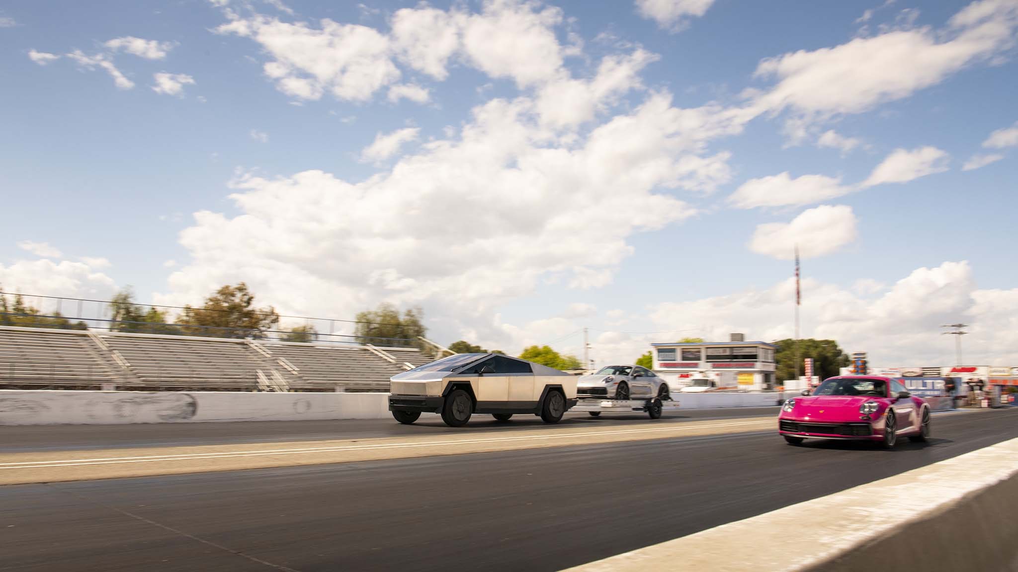 021 tesla cybertruck beast vs porsche 911 carrera t drag race towing rematch