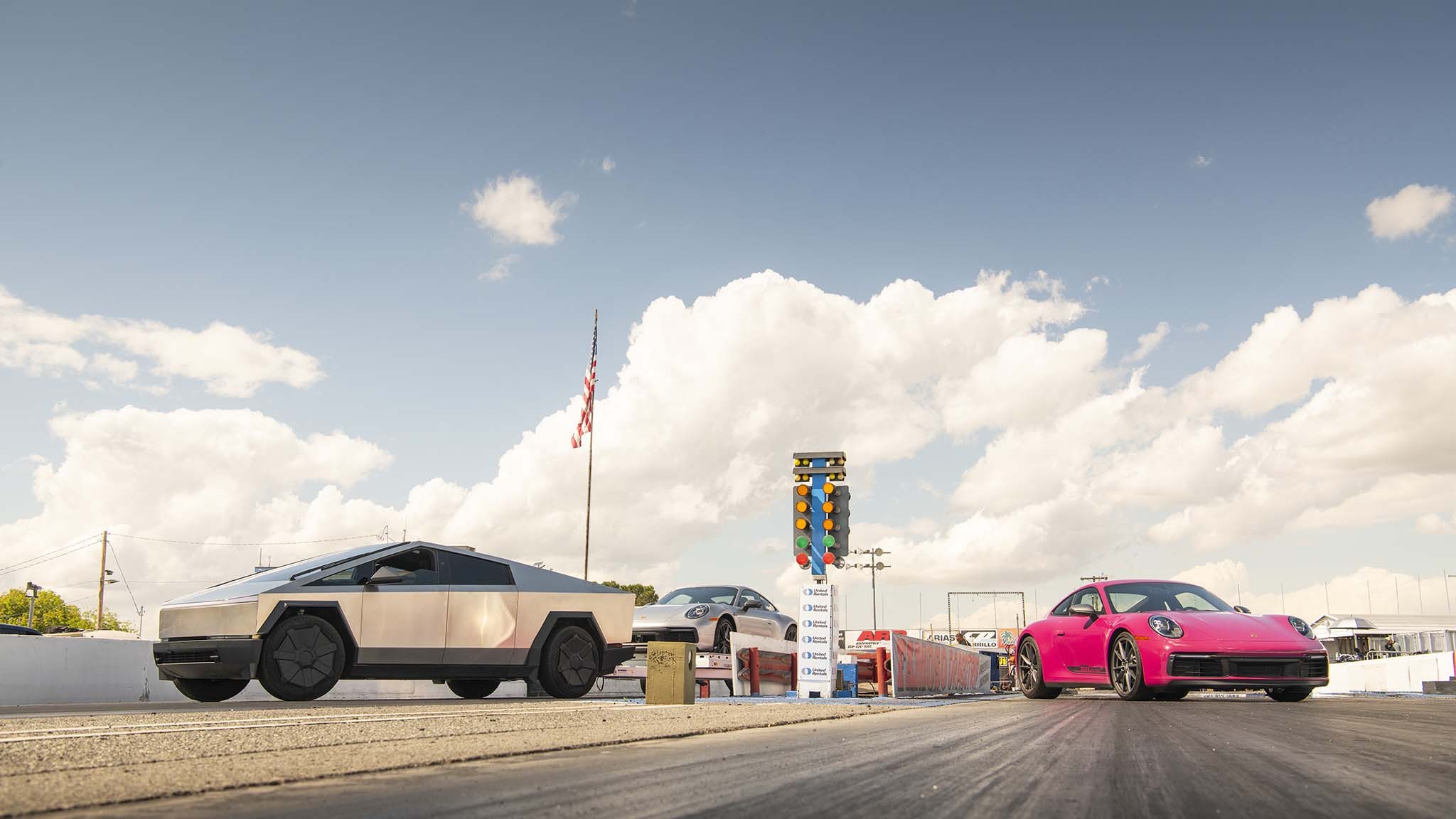 025 tesla cybertruck beast vs porsche 911 carrera t drag race towing rematch