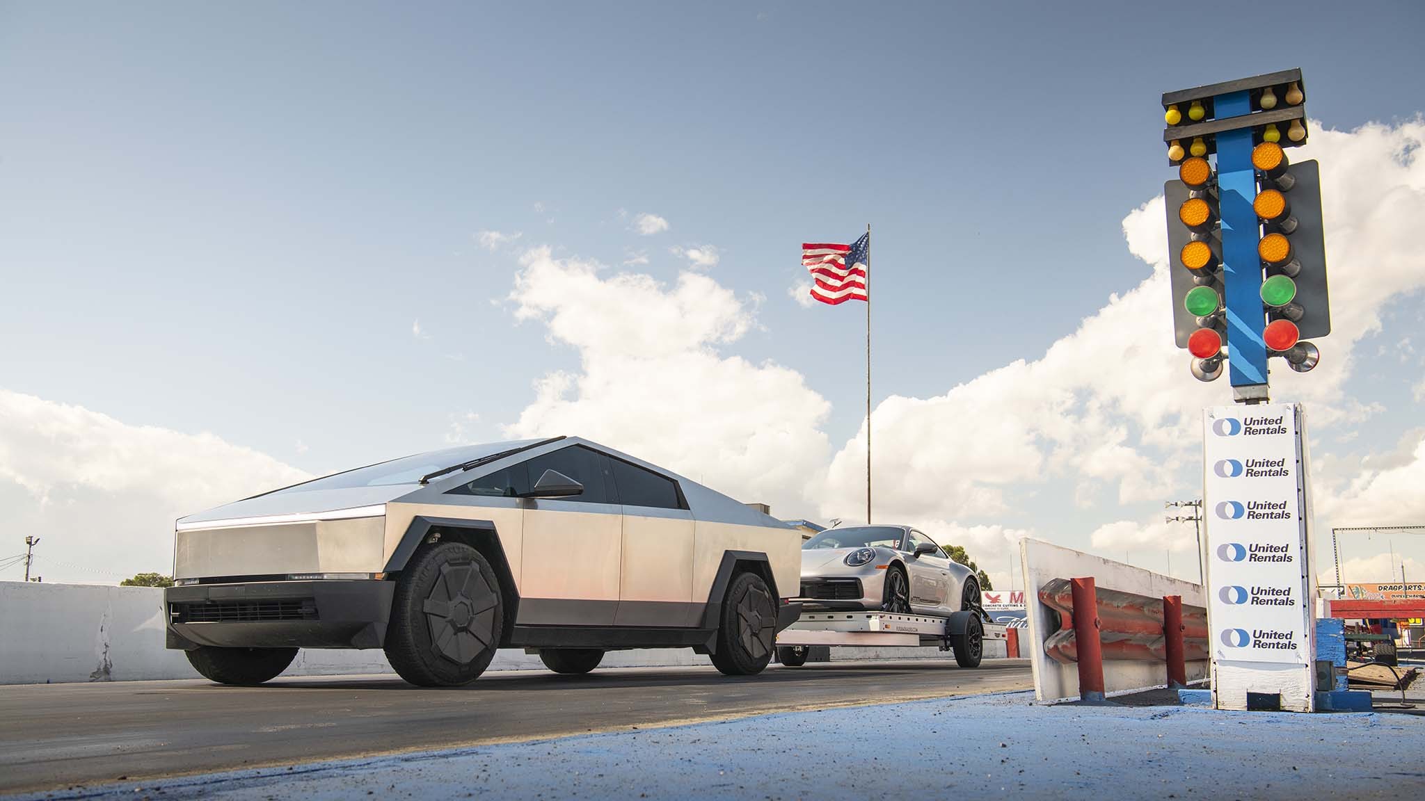 027 tesla cybertruck beast vs porsche 911 carrera t drag race towing rematch