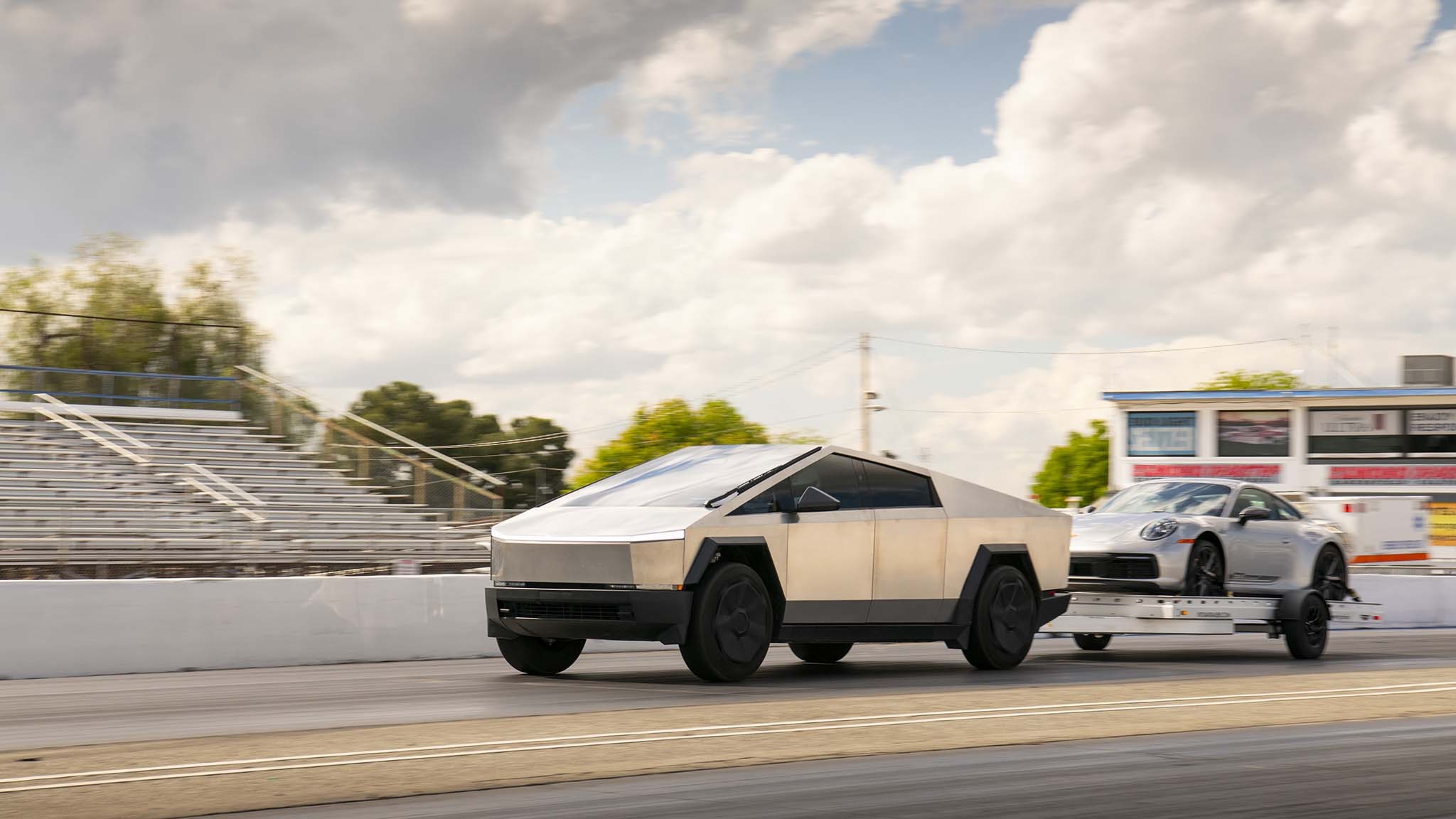 030 tesla cybertruck beast vs porsche 911 carrera t drag race towing rematch