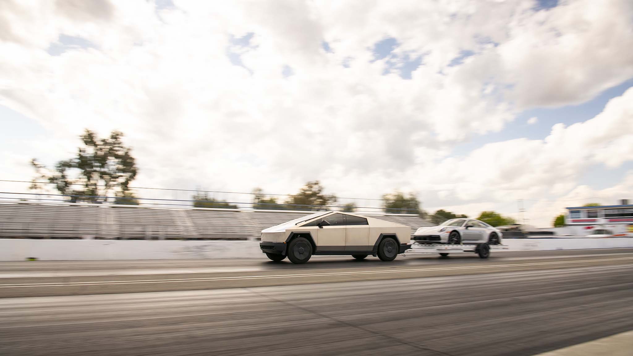 032 tesla cybertruck beast vs porsche 911 carrera t drag race towing rematch