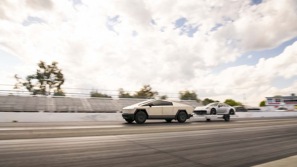 032 tesla cybertruck beast vs porsche 911 carrera t drag race towing rematch