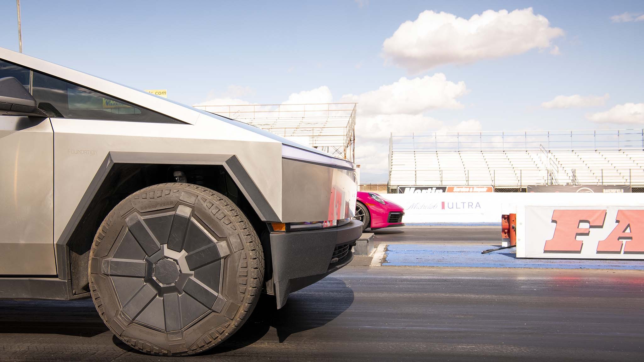 039 tesla cybertruck beast vs porsche 911 carrera t drag race towing rematch