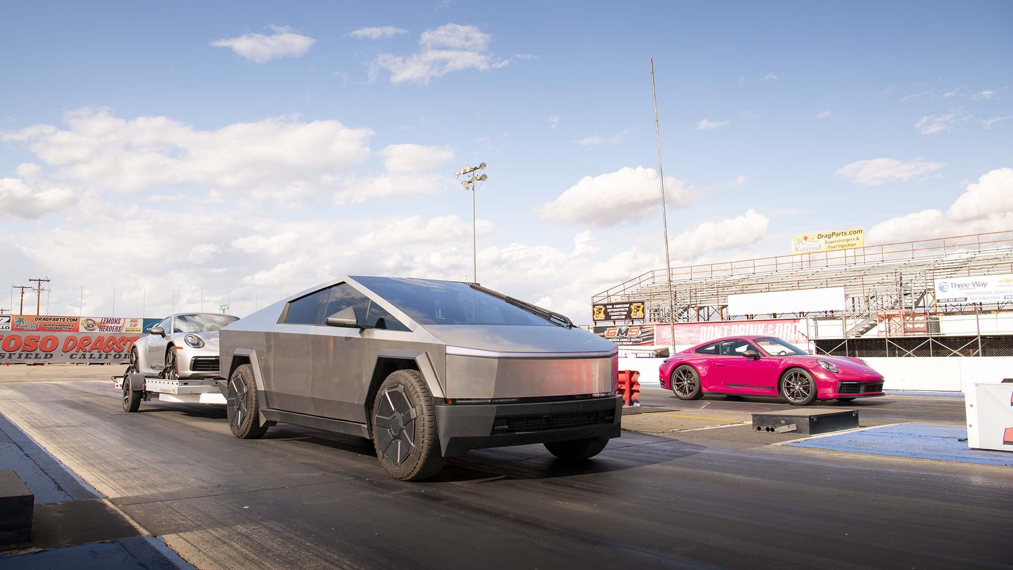 043 tesla cybertruck beast vs porsche 911 carrera t drag race towing rematch