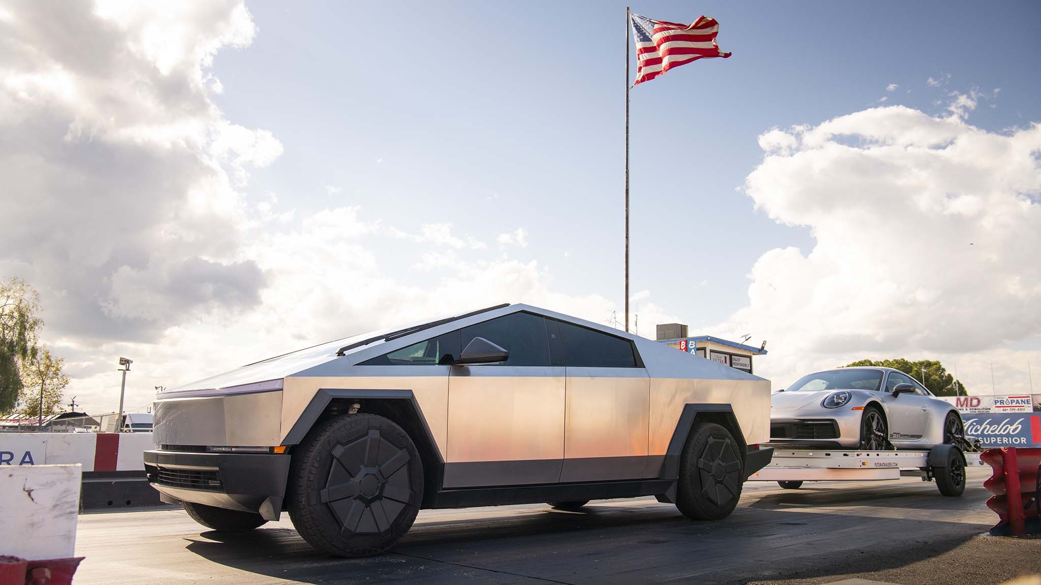 045 tesla cybertruck beast vs porsche 911 carrera t drag race towing rematch