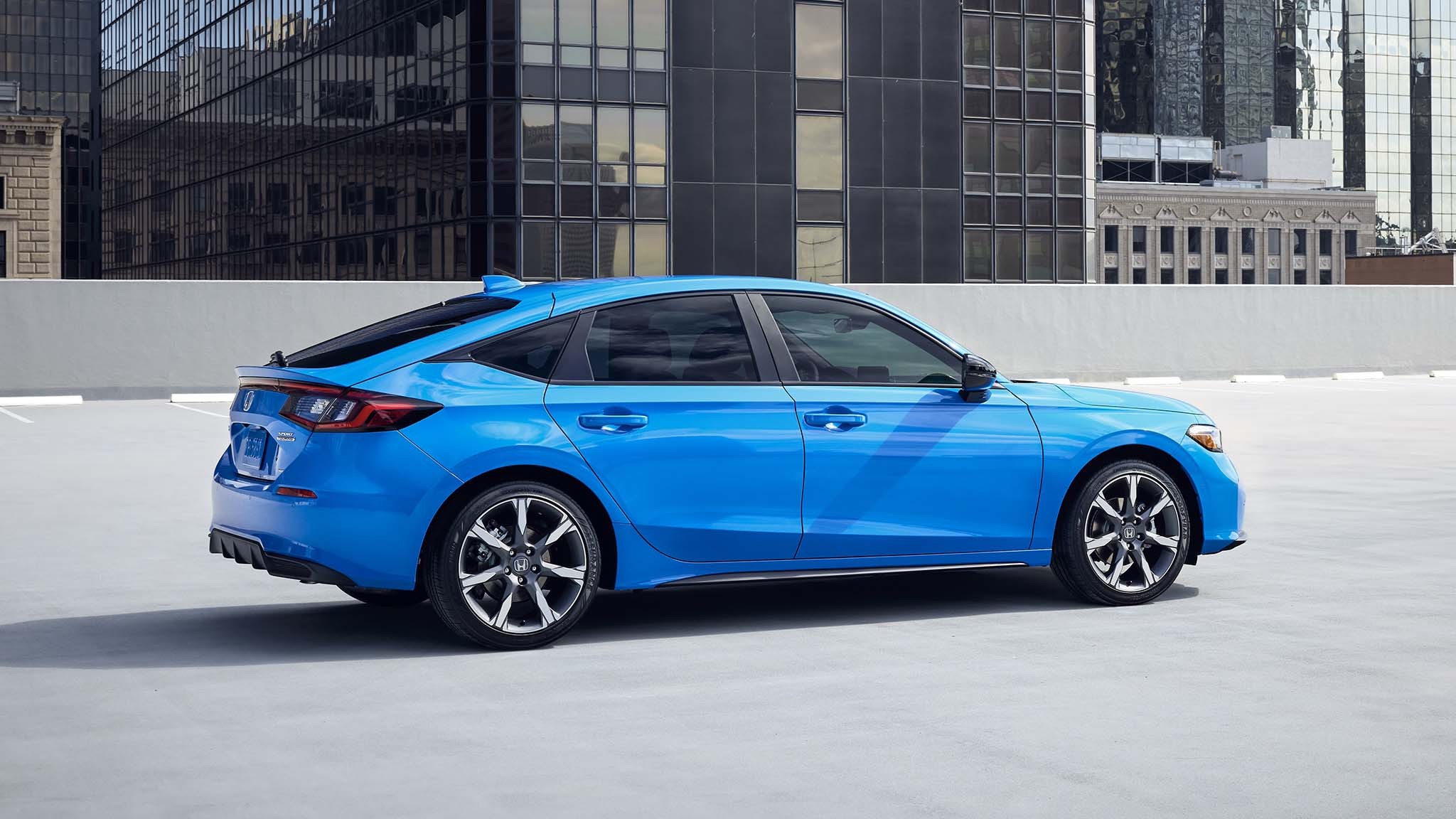 18 2025 Honda Civic Hatchback Sport Touring Hybrid