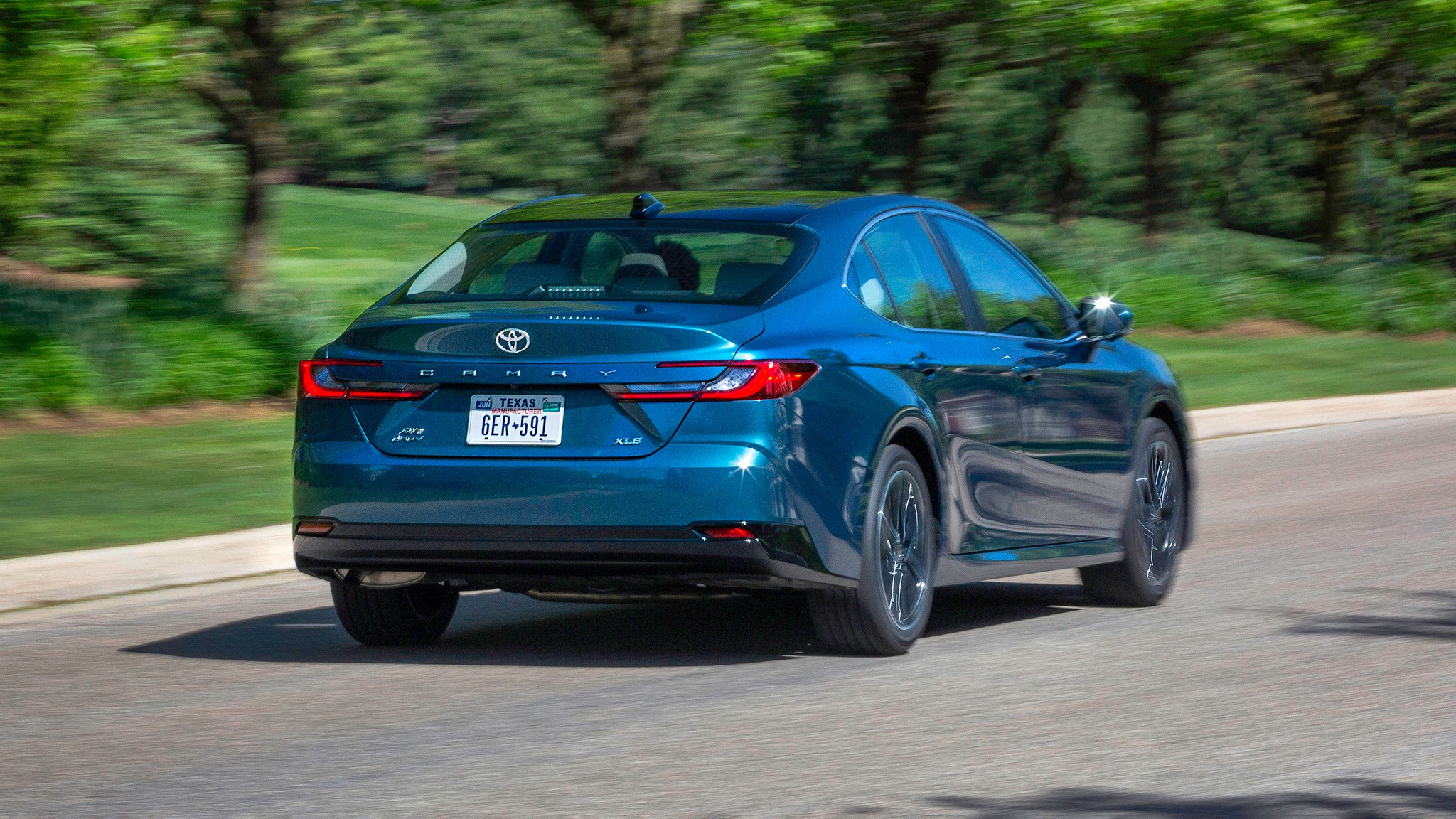 011 2025 Toyota Camry XLE AWD rear view