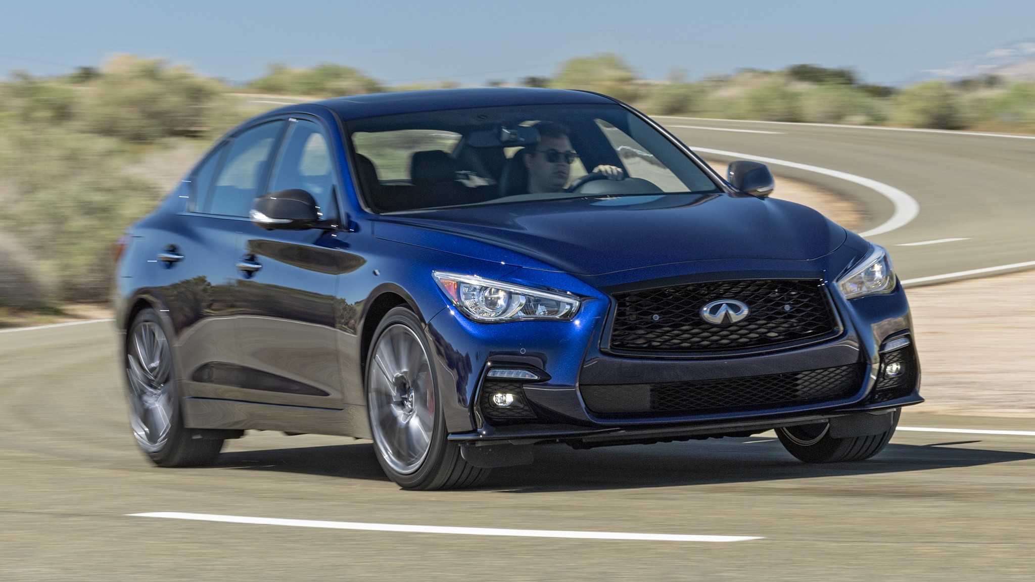003 2024 Infiniti Q50S Front Three Quarter Action