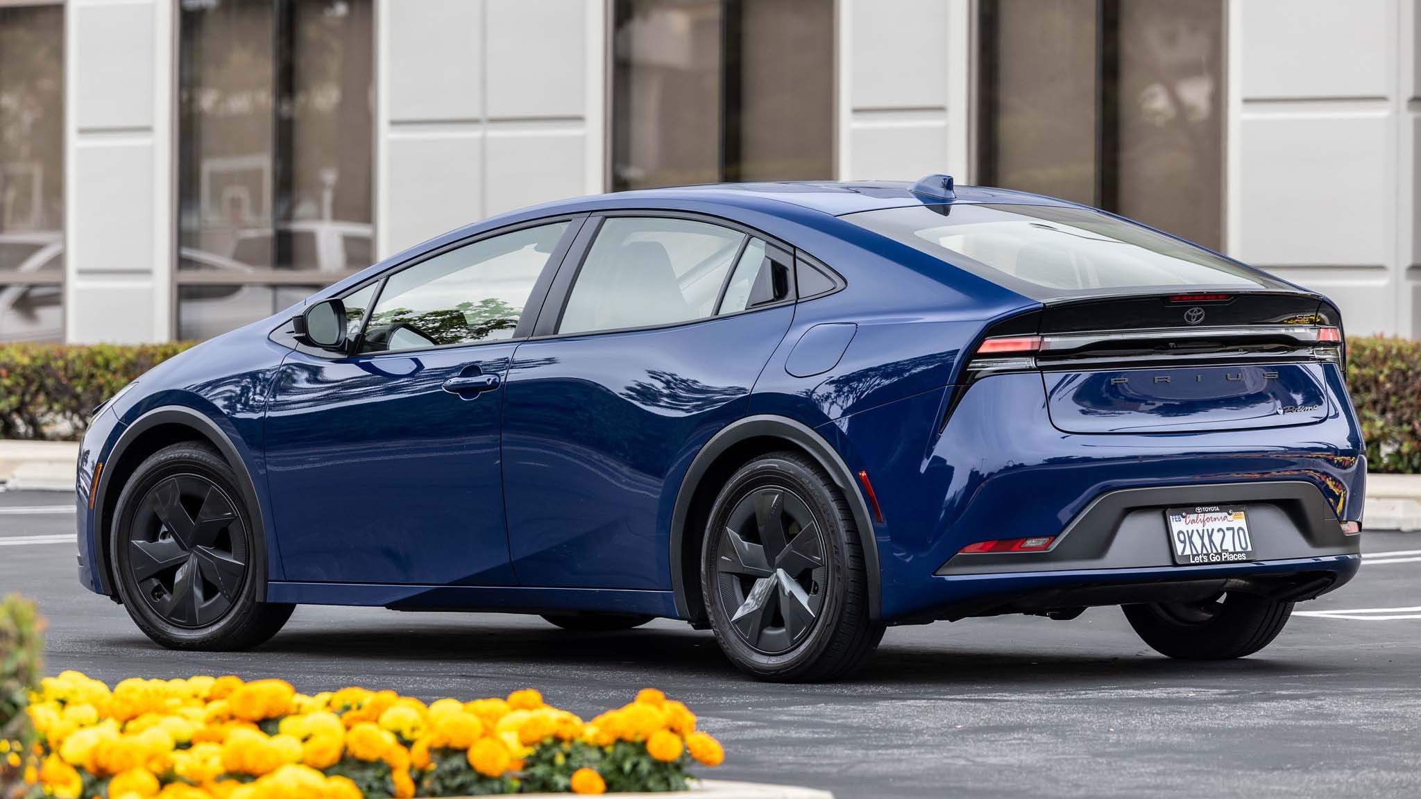 005 2024 Toyota Prius Prime SE rear three quarter view