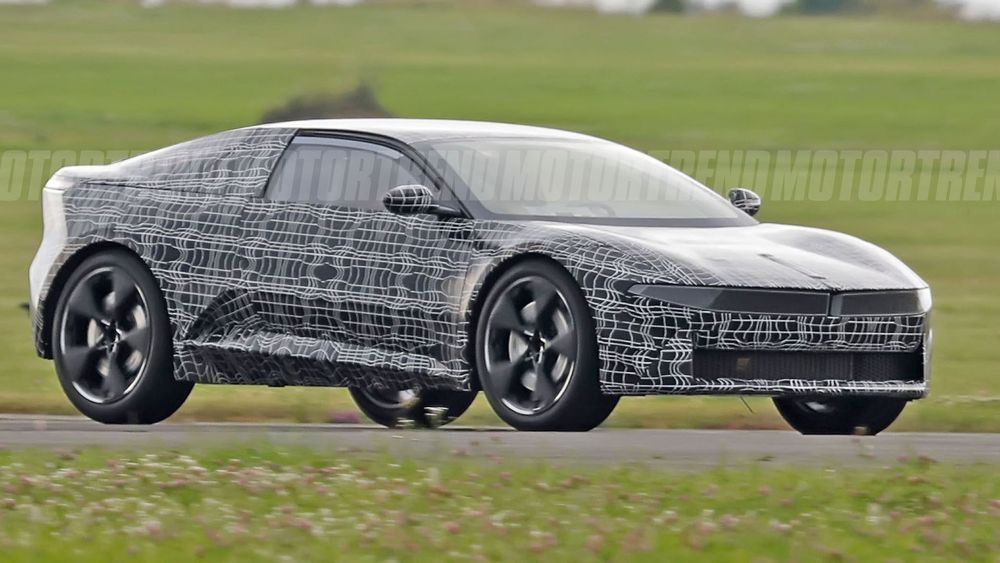 BMW's Rad Wedgy Supercar Is Hiding Under This Camo—Here's What We Know