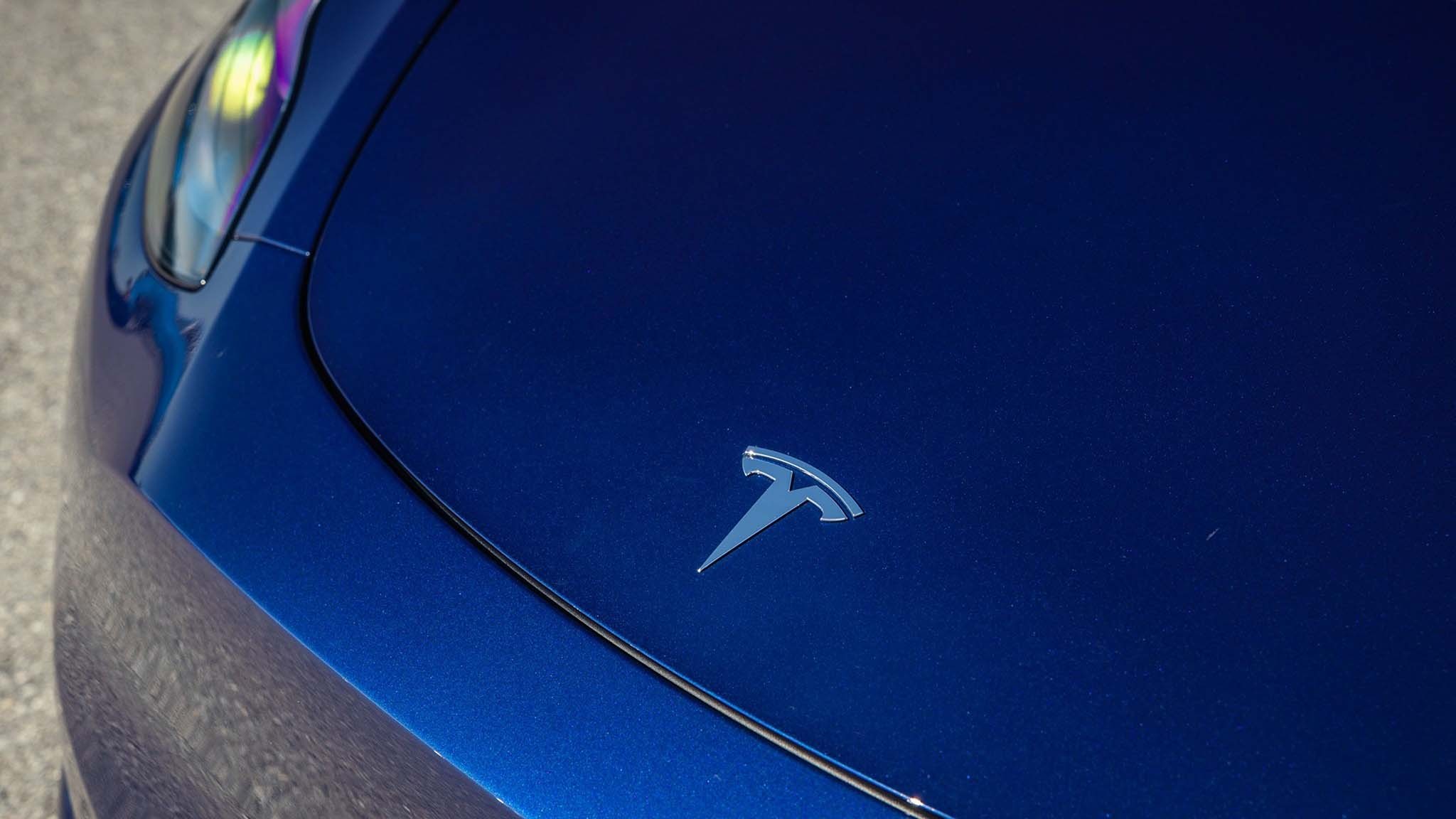 010 2023 tesla model y hood vs nissan ariya motortrend