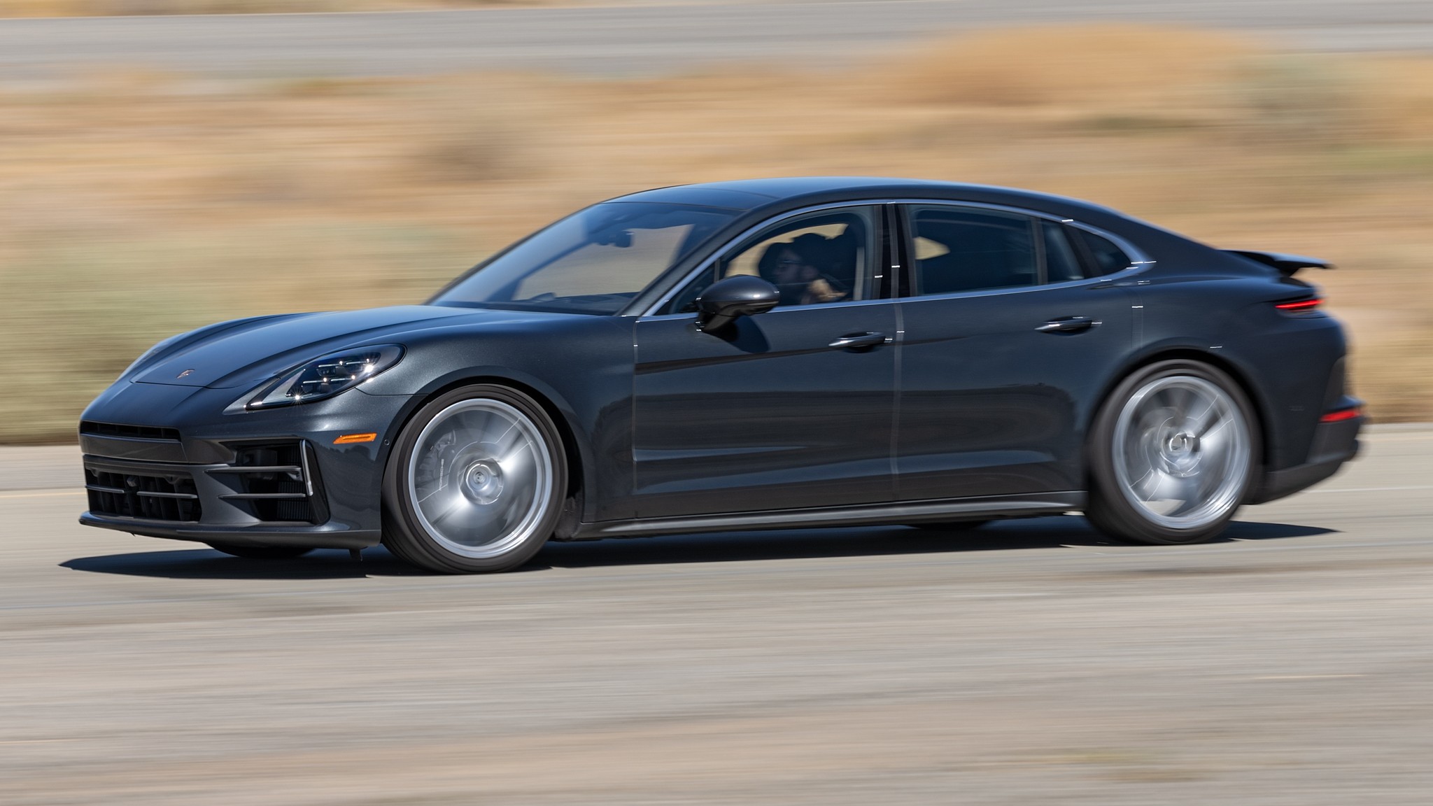 002 2024 Porsche Panamera Front Three Quarter Action