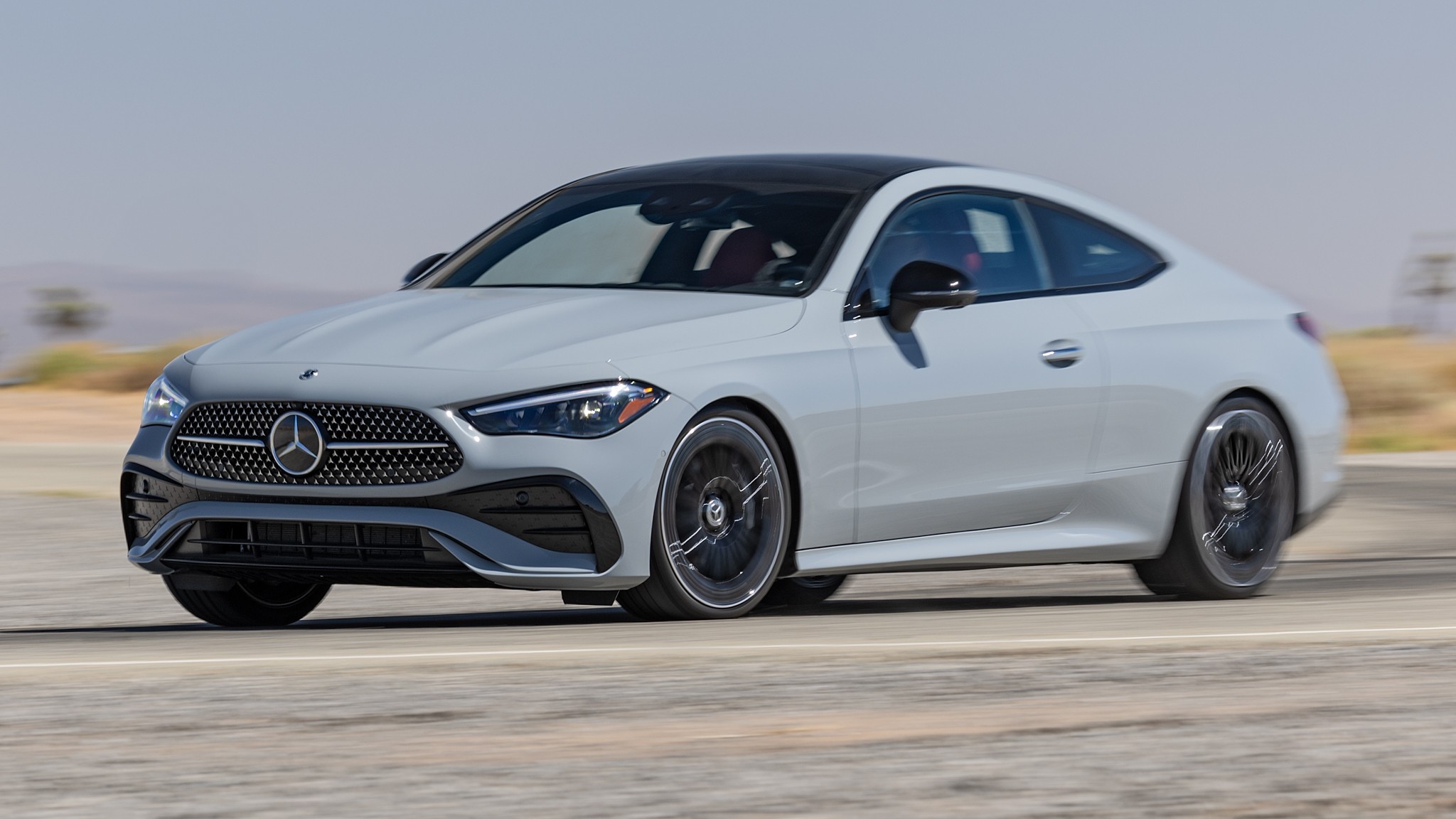 002 2025 Mercedes Benz CLE450 Coupe Front Three Quarter Action