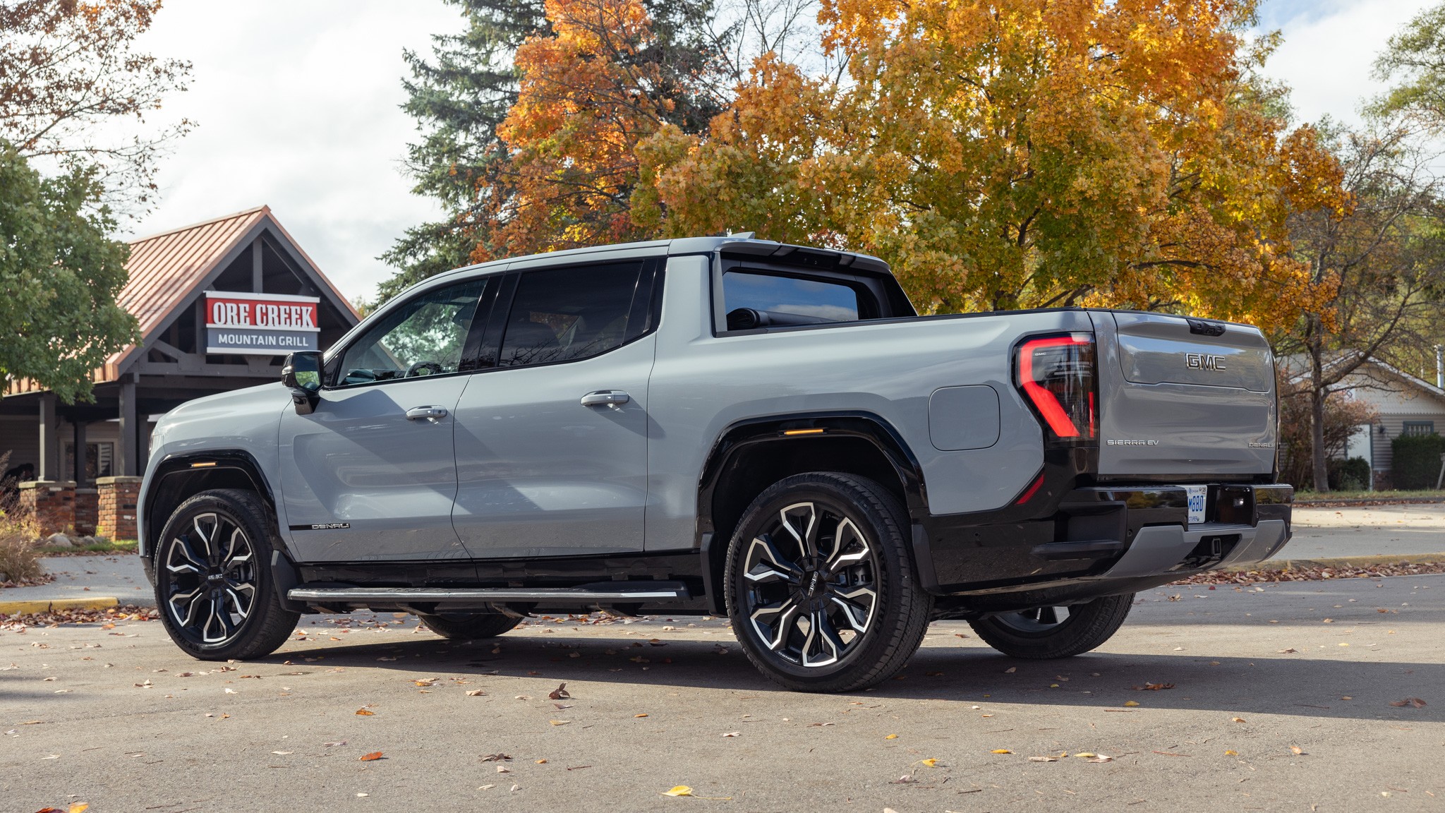 004 2024 GMC Sierra EV Denali Rear Three Quarter Static