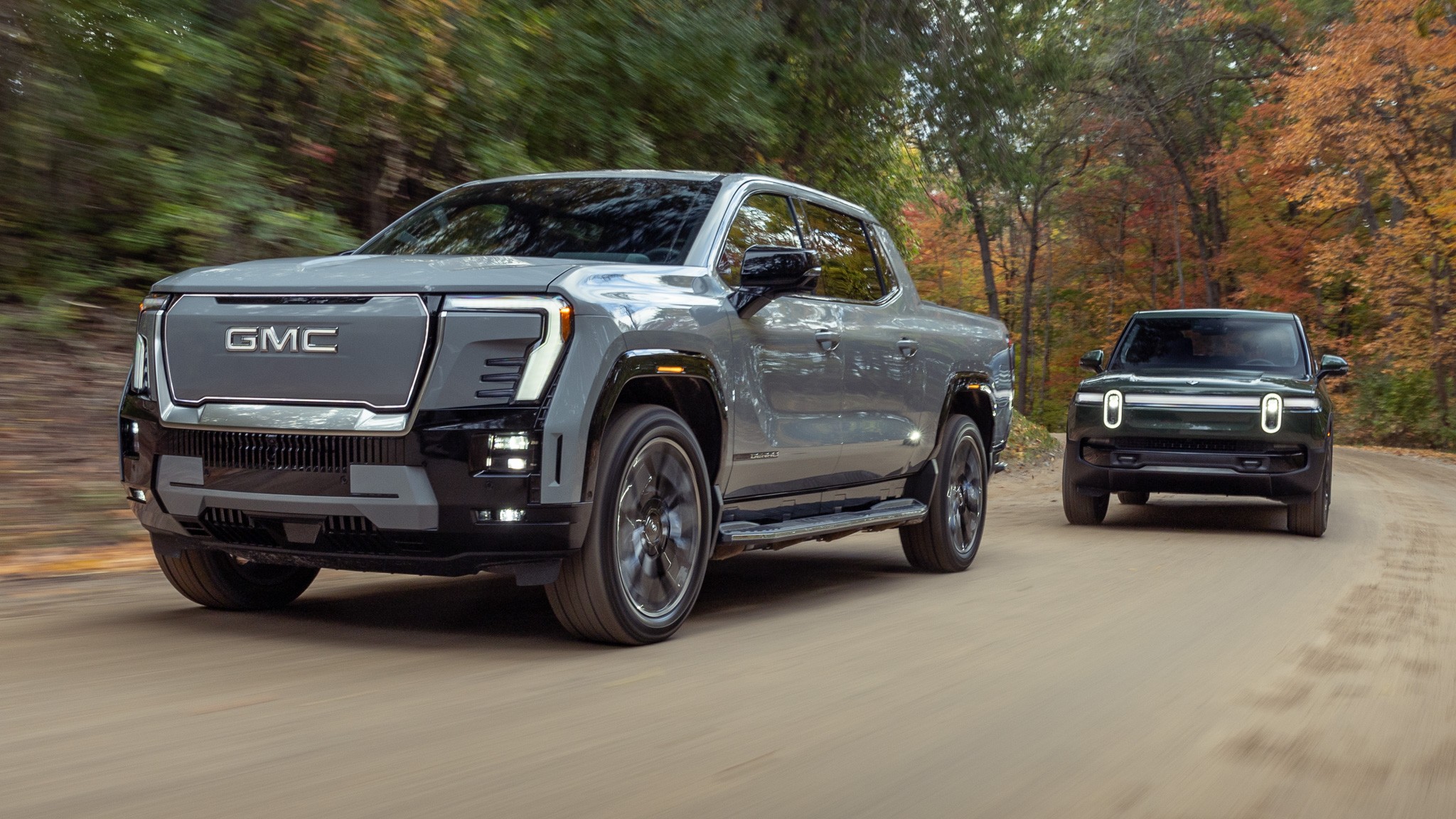 001 2024 GMC Sierra EV Denali vs 2025 Rivian R1T Tri Motor