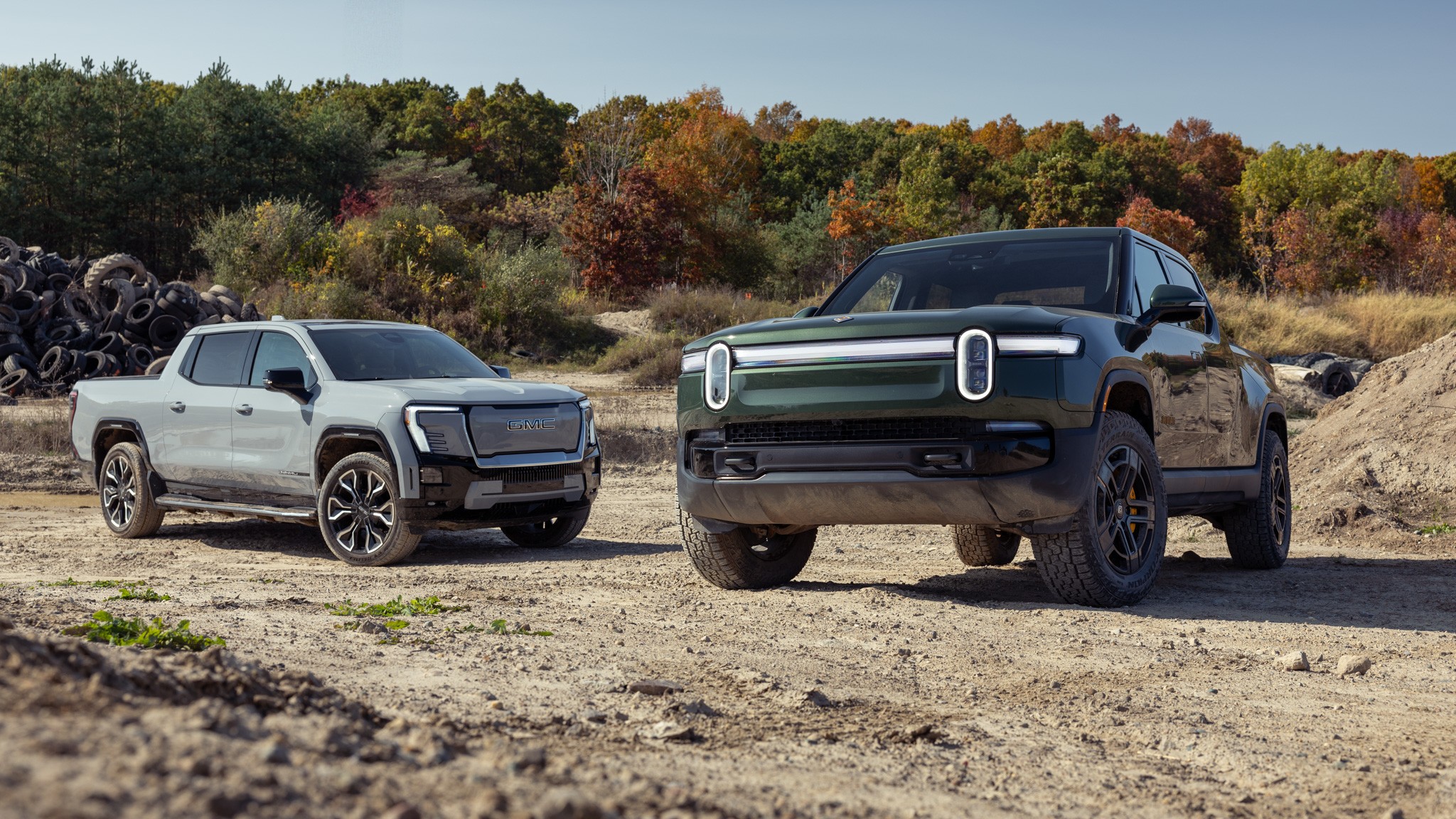 003 2024 GMC Sierra EV Denali vs 2025 Rivian R1T Tri Motor