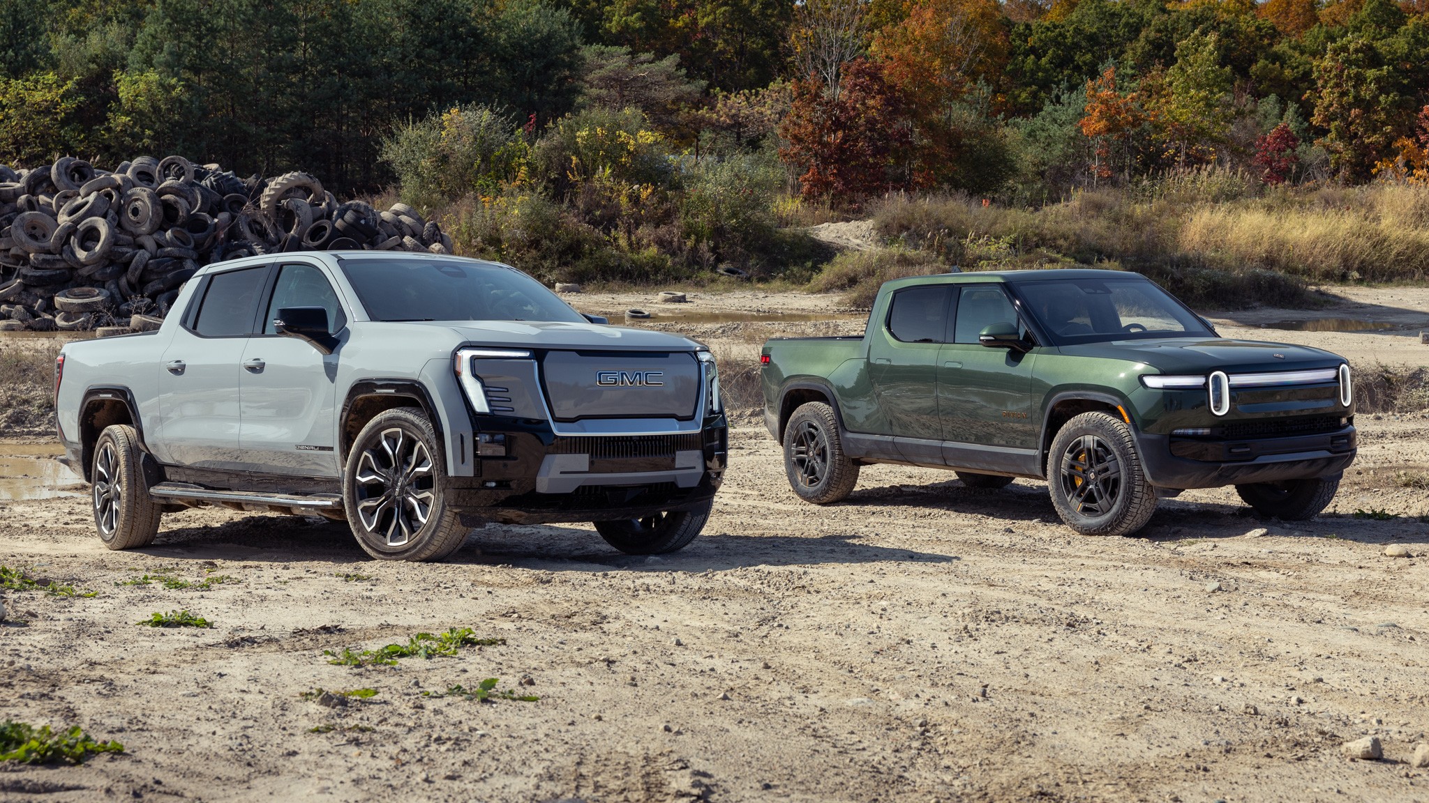 004 2024 GMC Sierra EV Denali vs 2025 Rivian R1T Tri Motor