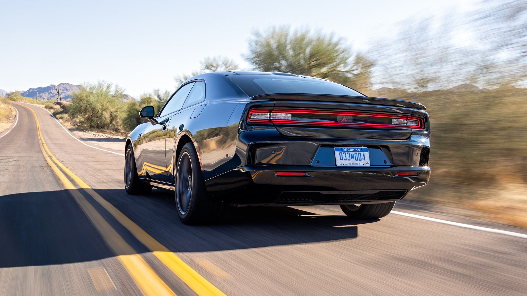 002 2024 Dodge Charger Daytona Rear Three Quarter Action