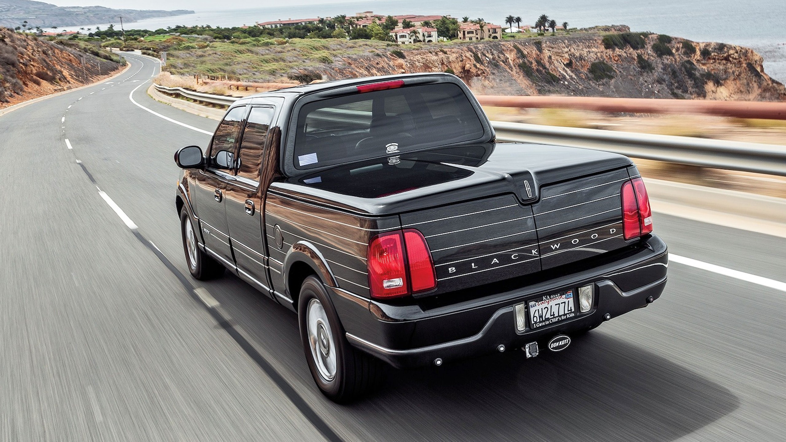 004 ugly truck 2002 lincoln blackwood driving rear three quarter