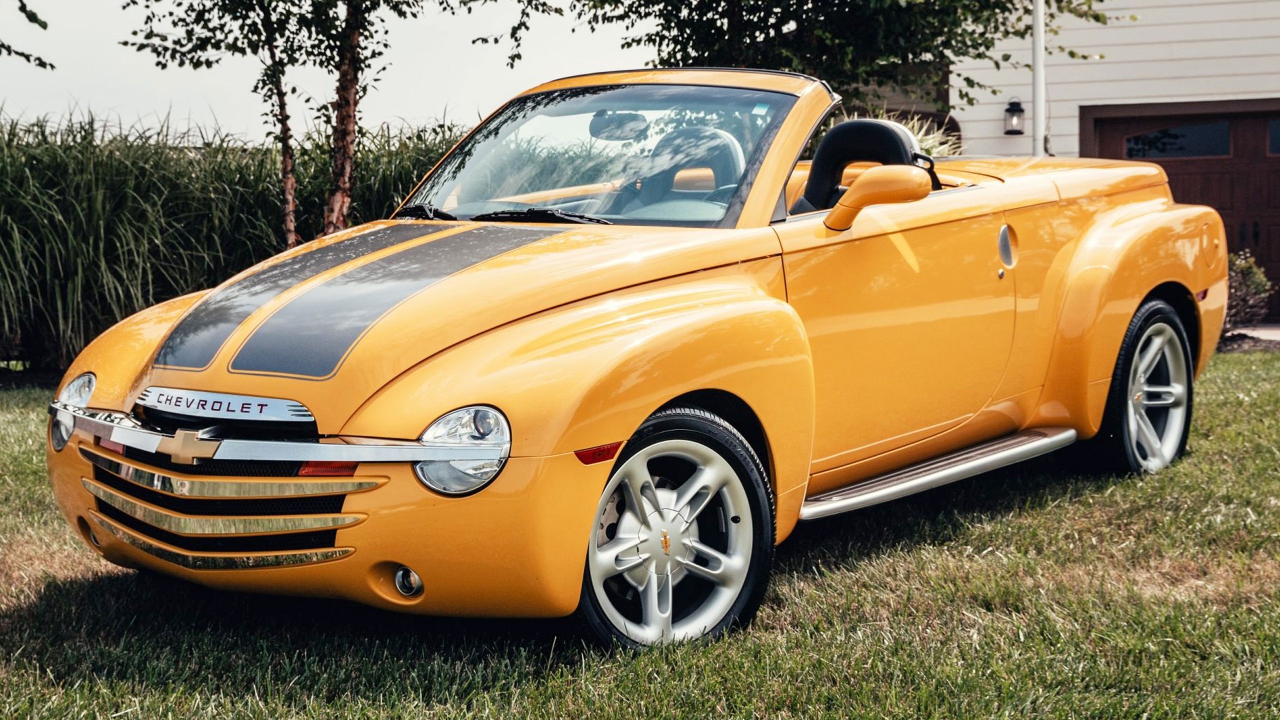 006 ugly truck 2004 chevy ssr yellow black front three quarter