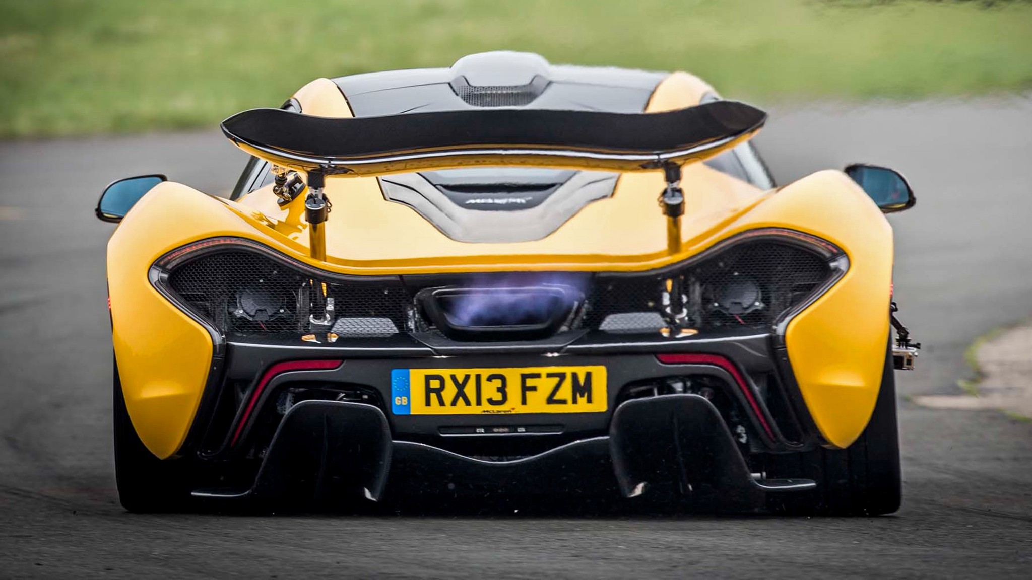 2014 mclaren p1 yellow rear end