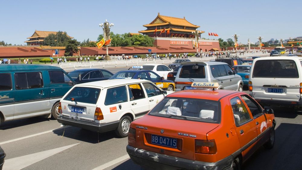 Cars in traffic jam near Forbidden City 2000